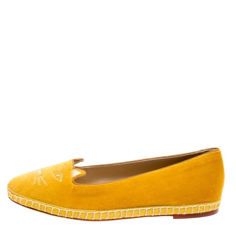 Vibrant and fun, these Charlotte Olympia flats are a must buy! They are crafted from cotton velvet and feature round toes that are detailed with a kitty's face. Comfortable leather lined insoles complete this lovely pair.

Includes: Original