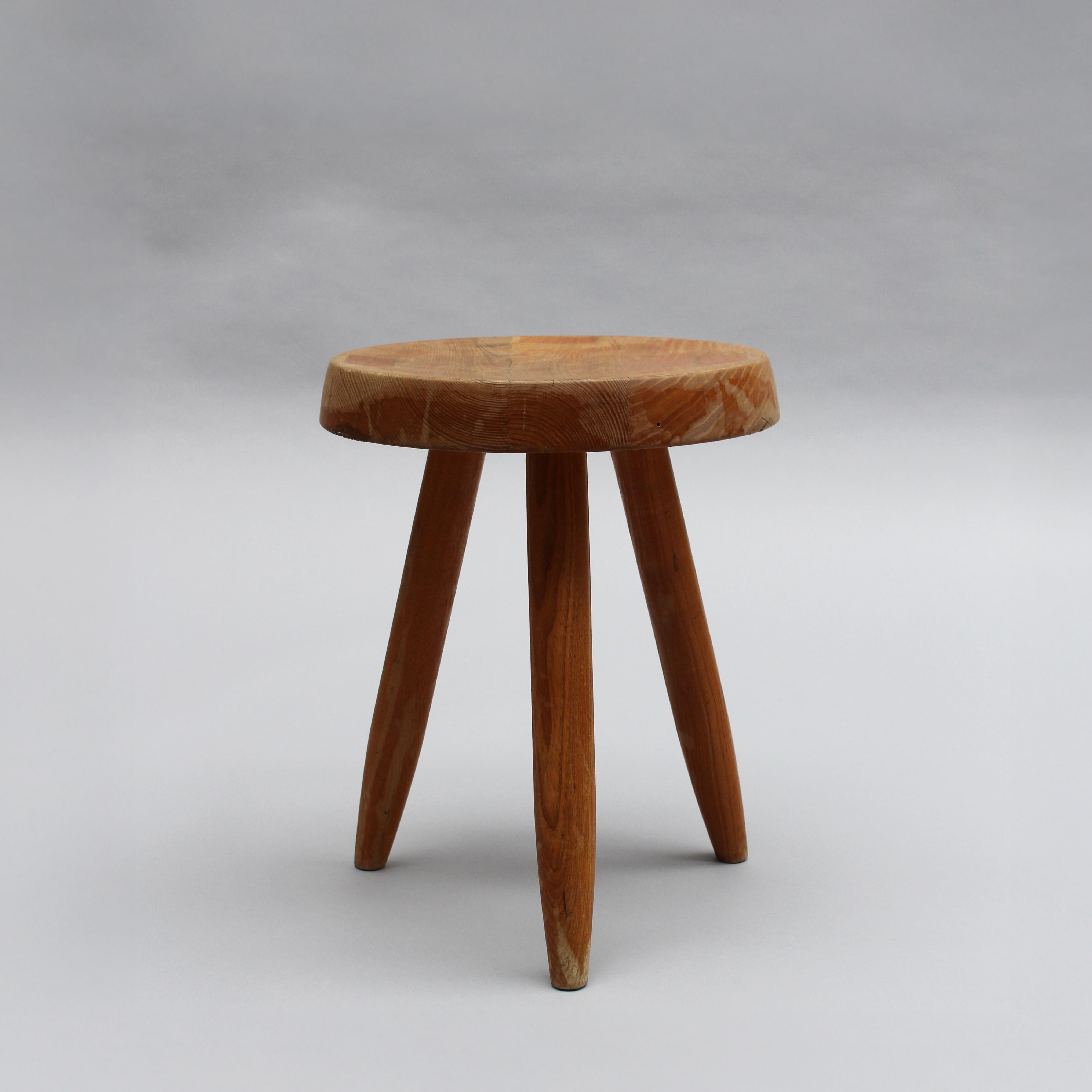 Low Solid Oak Berger Stool by Charlotte Perriand.

Price includes cleaning/refinishing upon request.