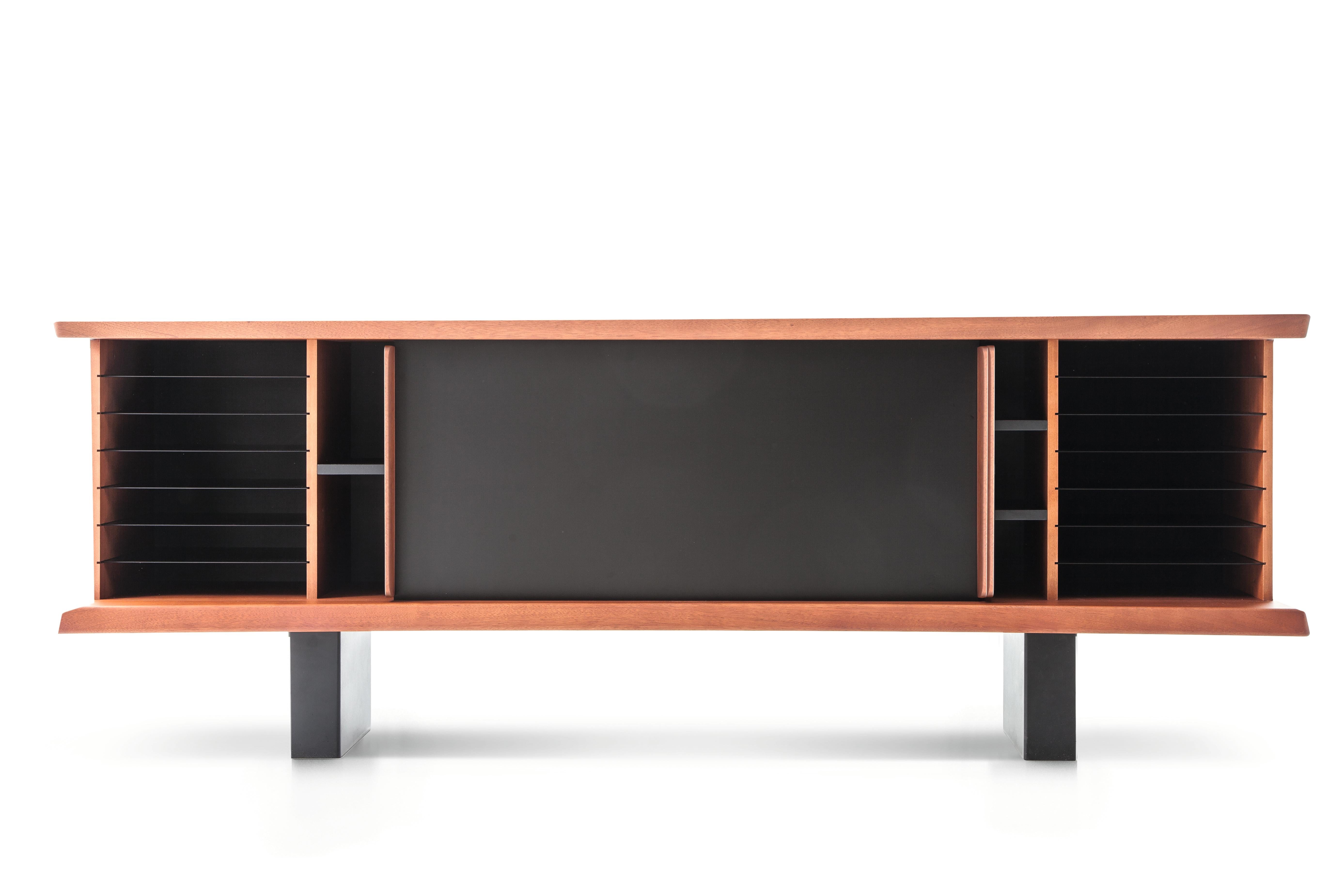 The Charlotte Perriand 513 Riflesso storage unit, reissued by Cassina, is a true work of art that reflects the designer's impeccable taste and sense of style. Originally designed in 1939, this piece has been reissued since 2014 and continues to
