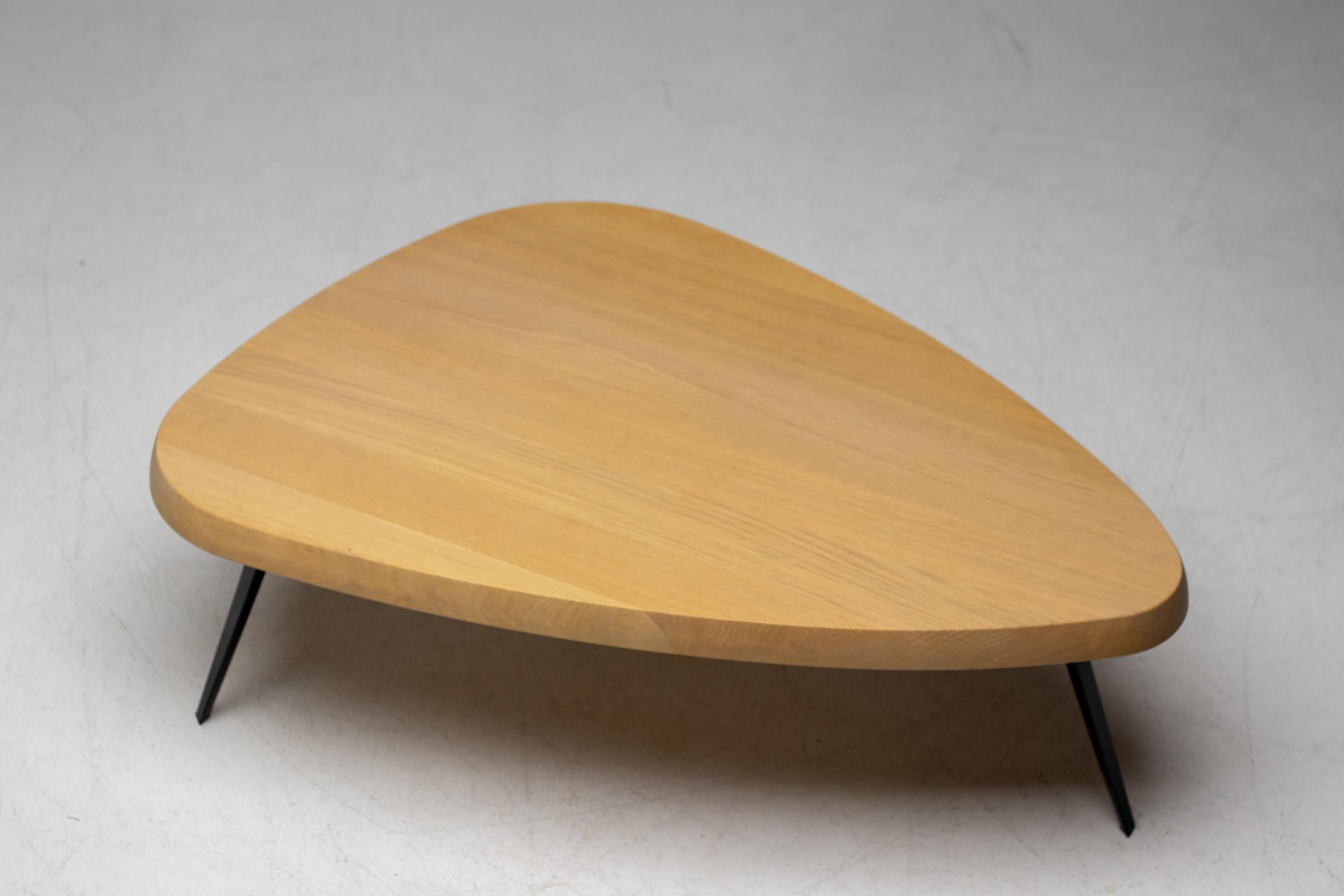 Table designed by Charlotte Perriand circa 1952. Manufactured in 2014 by Cassina, Italy. 
Lovingly cared for by a collector of Jean Prouvé, Le Corbusier and Charlotte Perriand furniture.
Marked and numbered with branded mark. 

Included as one