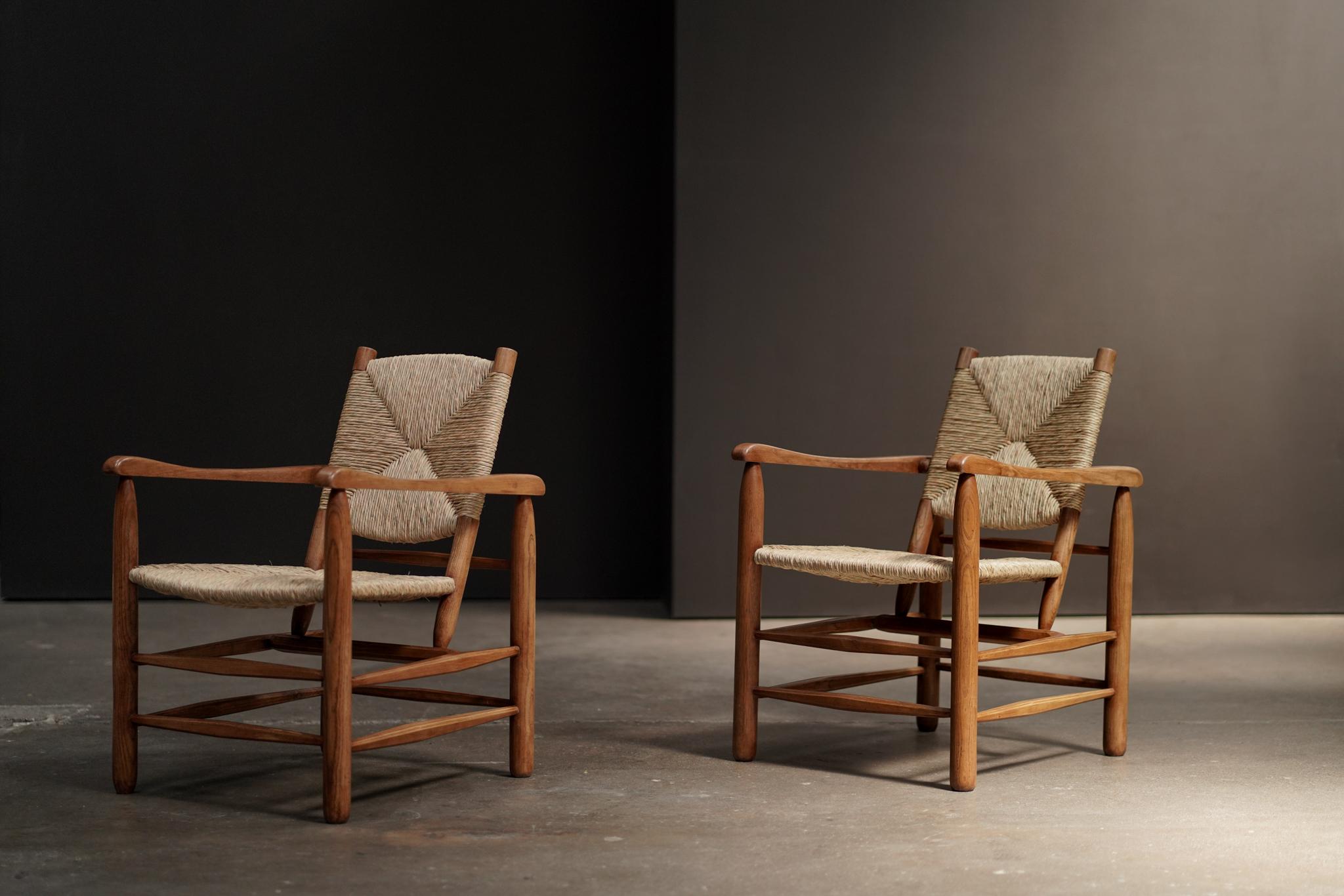 A study in proportion and material harmony, the Model No. 21 Armchair by Charlotte Perriand exemplifies her modernist ethos. With its clean lines, solid oak wood frame, and woven seat, the chair balances structure with warmth — timeless in form, and