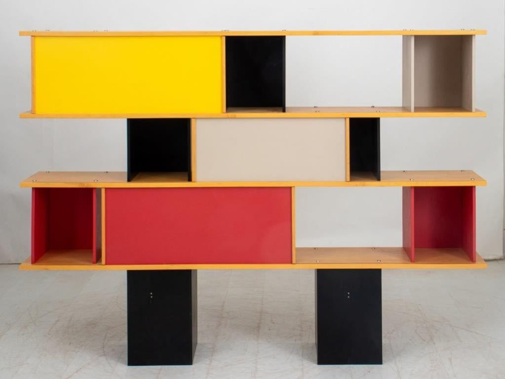 Charlotte Perriand (French, 1903-1999(, Attributed Mid-Century Modern Three Tiered Wood Shelving Unit with 8 cube shelves and three sliding doors in red, white, and black. Provenance: From a Riverside Drive Collection.
