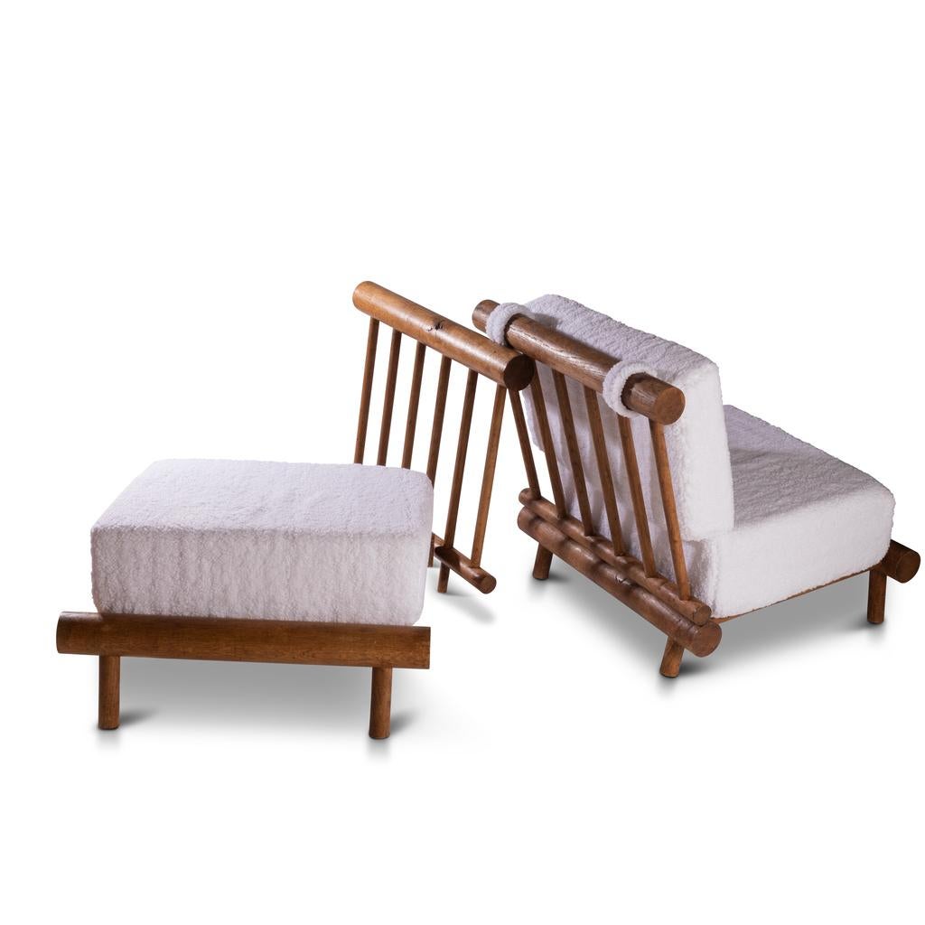 Charlotte PERRIAND (1903-1999, france) : Pair of low fireplace massive oak sofas said 