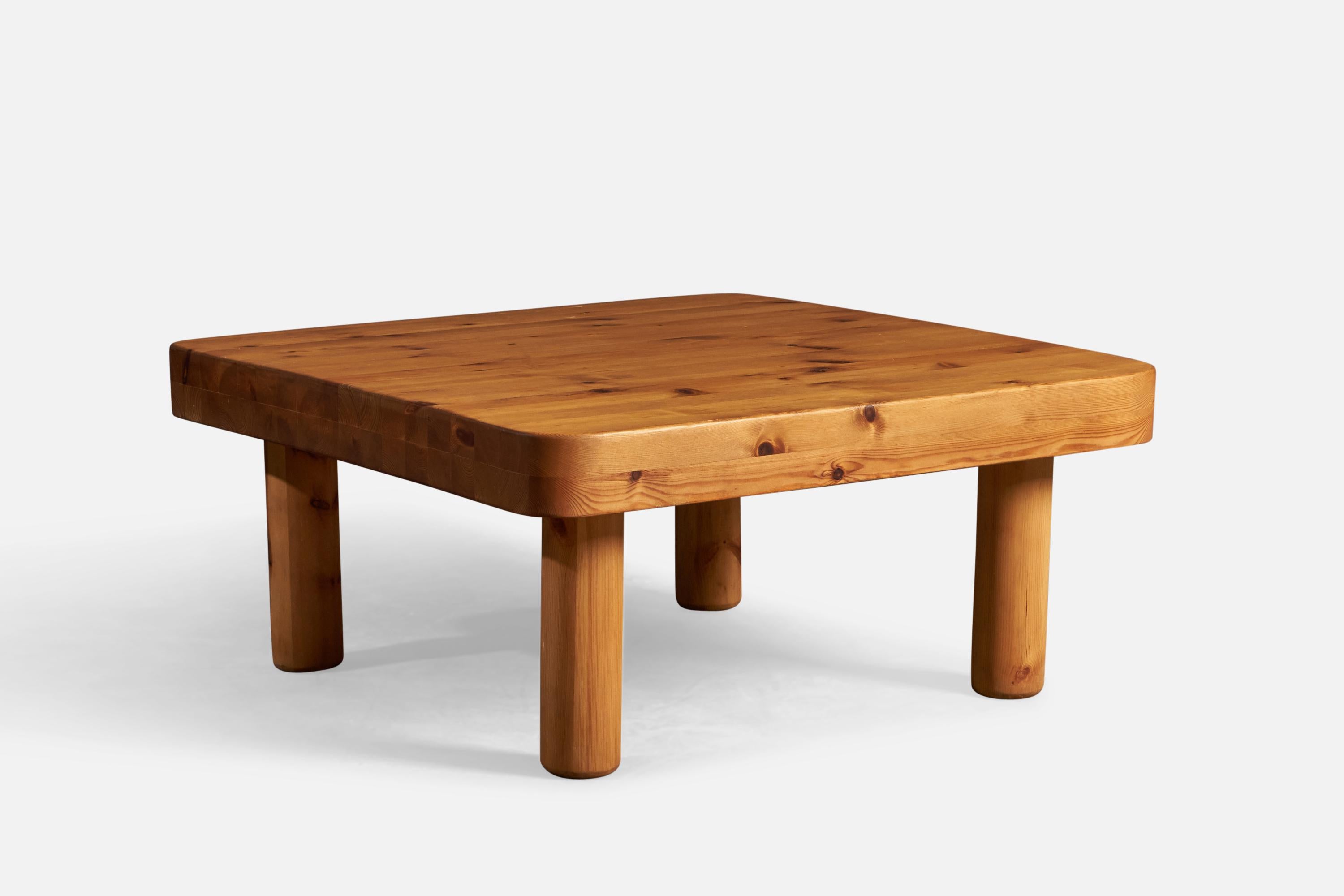 A solid pine coffee table design attributed to Charlotte Perriand, France, c. 1960s.