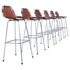 Used Charlotte Perriand bar stools in leather Les Arcs Ski Resort France 1960