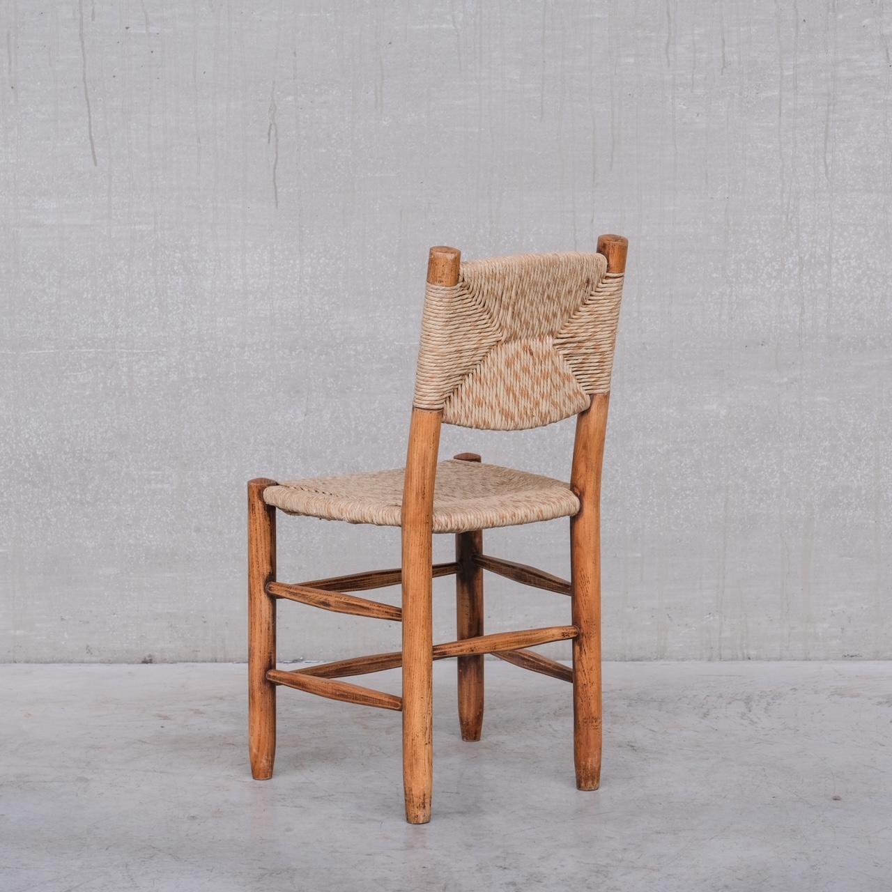 Charlotte Perriand 'Bauche' Model 19 Mid-Century French Rush Dining Chairs In Good Condition In London, GB