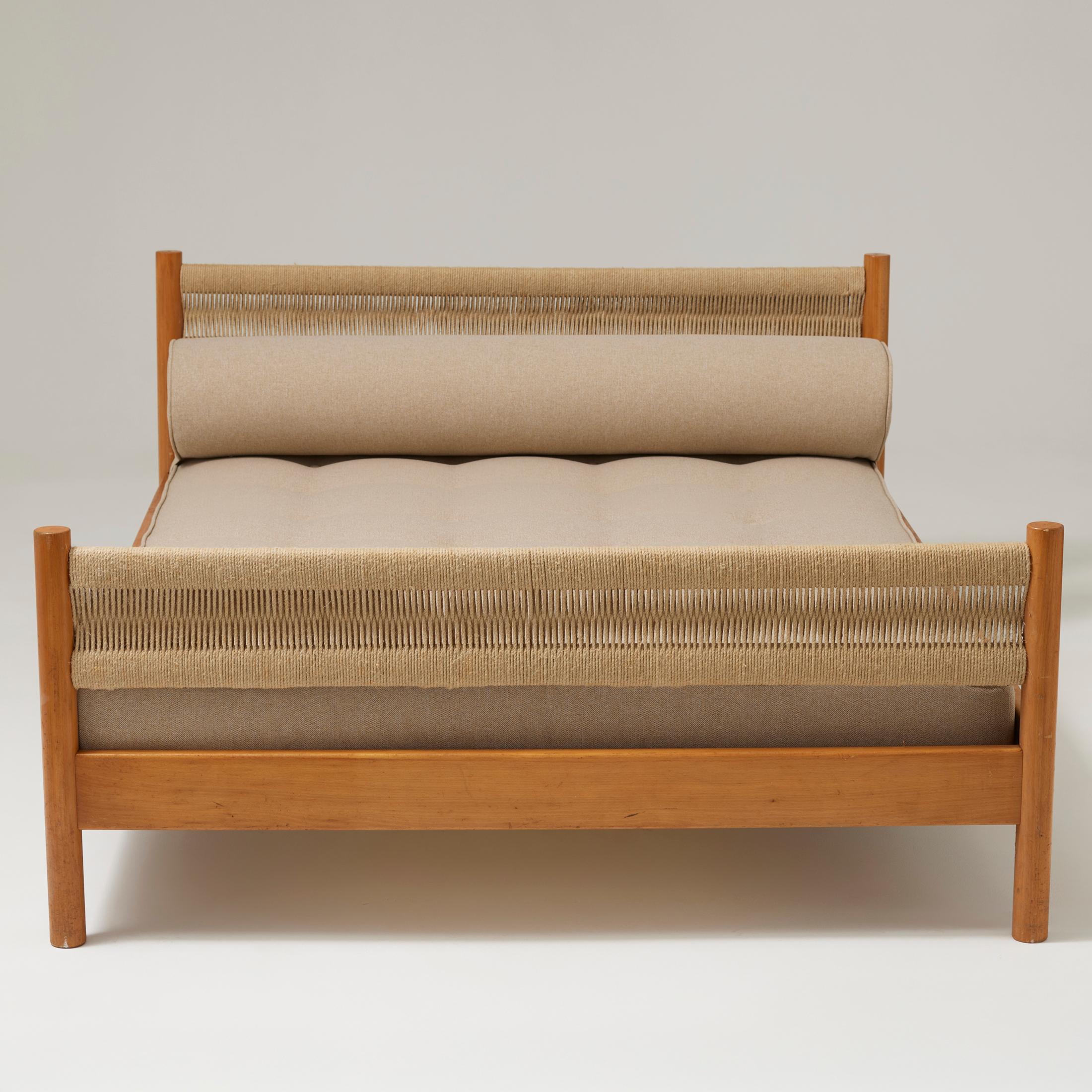 Bed designed by Charlotte Perriand for Meribel, circa 1960.
Manufactured in France.

Pinewood and rope

In good original condition with minor wear consistent with age and use, preserving a beautiful patina.

Charlotte Perriand (1903-1999). She was
