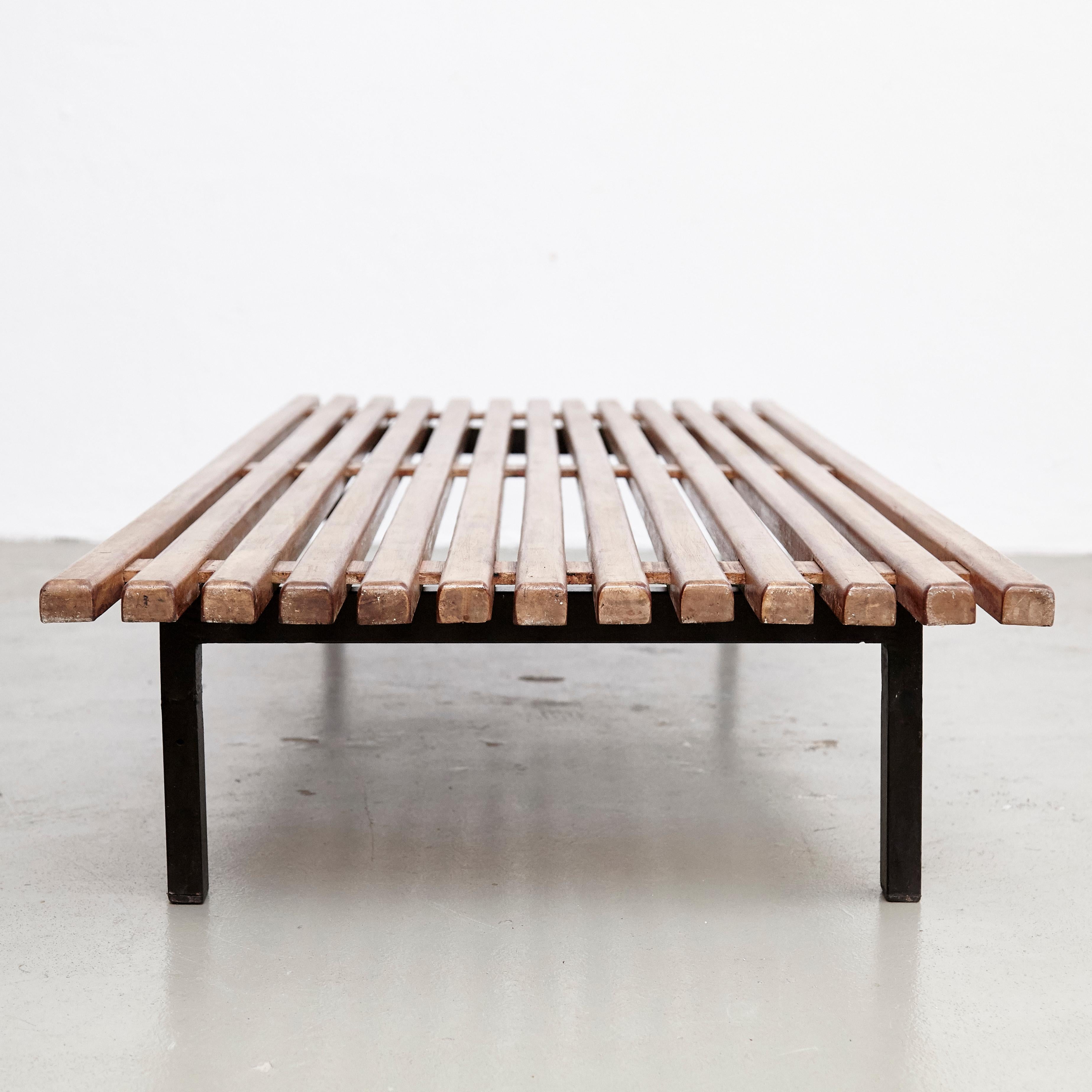 Bench designed by Charlotte Perriand, circa 1950.
Edited by Steph Simon (France)

Wood, metal frame legs.

Provenance: Cansado, Mauritania (Africa).

In original condition, with minor wear consistent with age and use, preserving a beautiful