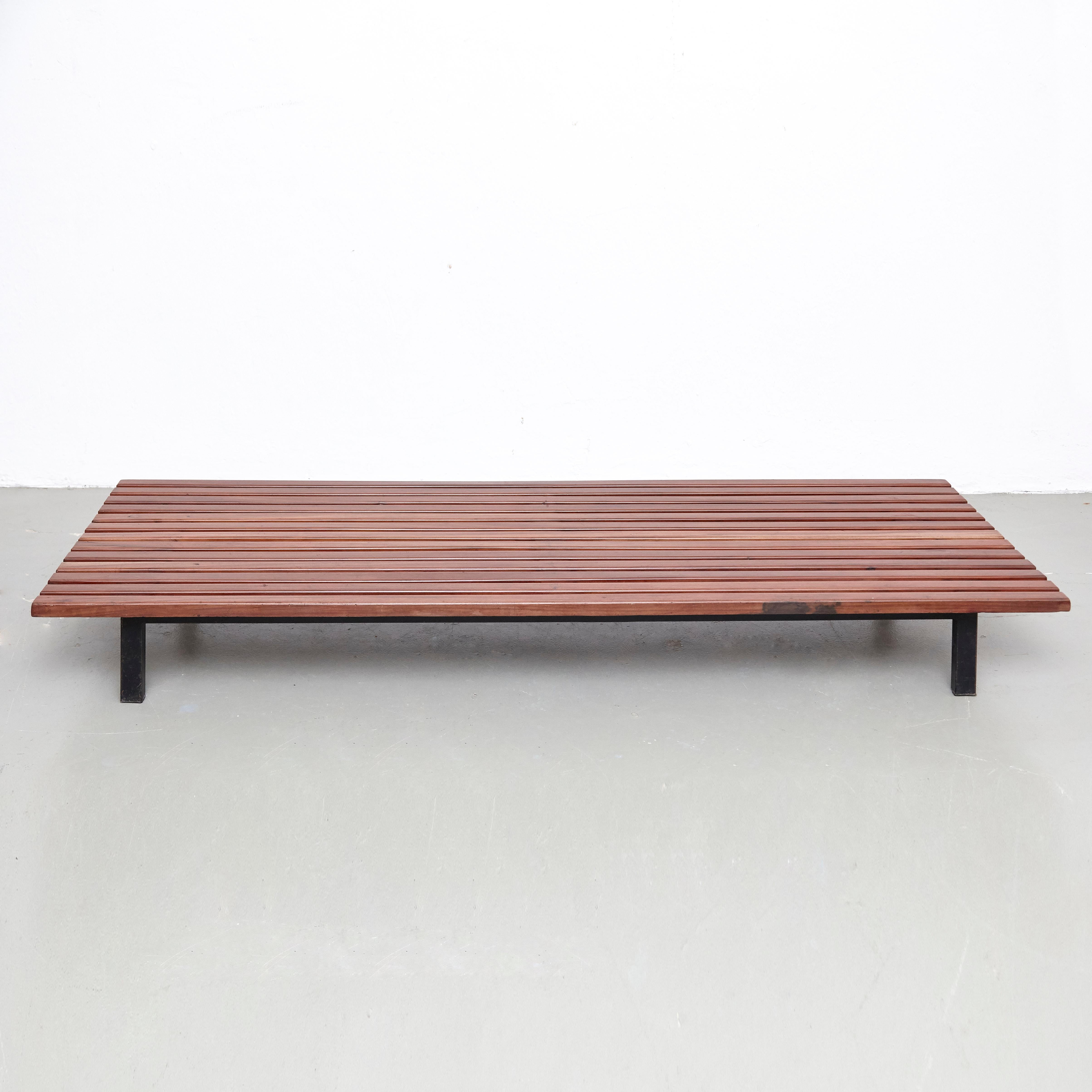 Bench designed by Charlotte Perriand, circa 1950.
Manufactured by Steph Simon (France) circa 1950.
Wood, lacquered metal frame and legs.

Provenance: Cansado, Mauritania (Africa).

In original condition, with minor wear consistent with age and