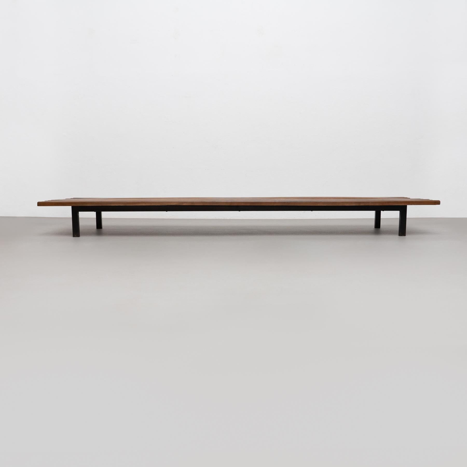 Bench designed by Charlotte Perriand, circa 1950.
Manufactured by Steph Simon (France), circa 1950.
Wood, lacquered metal frame and legs.

Provenance: Cansado, Mauritania (Africa).

In original condition, with minor wear consistent with age