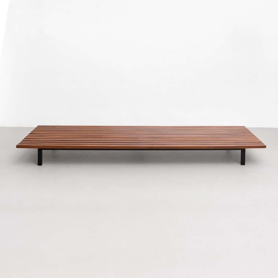 Bench designed by Charlotte Perriand, circa 1950.
Manufactured by Steph Simon (France), circa 1950.
Wood, lacquered metal frame and legs.

Provenance: Cansado, Mauritania (Africa).

In original condition, with minor wear consistent with age