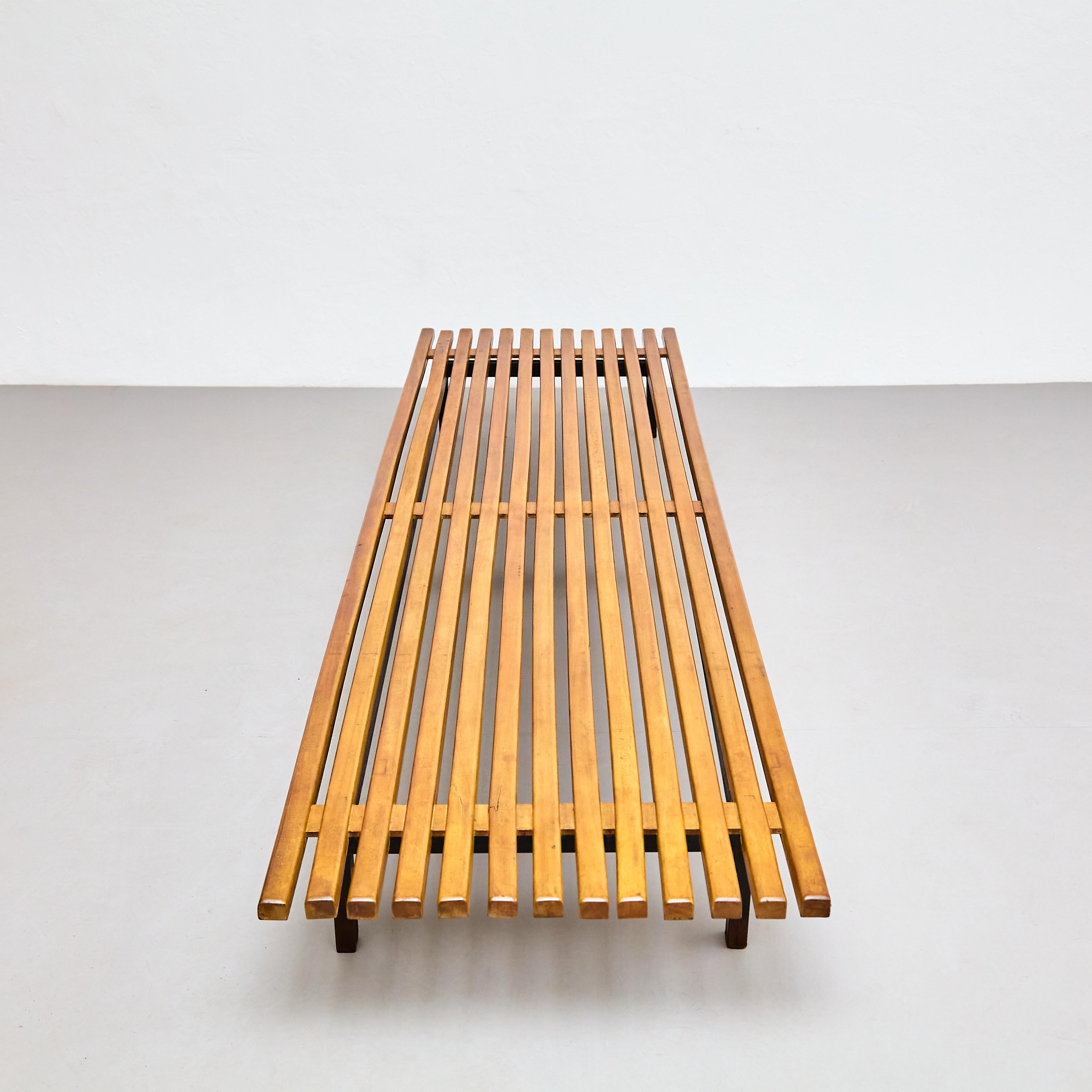 Bench designed by Charlotte Perriand.
Edited by Steph Simon.

Provenance: Cansado, Mauritania (Africa).

In original condition with minor wear consistent of age and use, preserving a beautiful patina.

Materials: 
Wood, metal 

Dimensions: