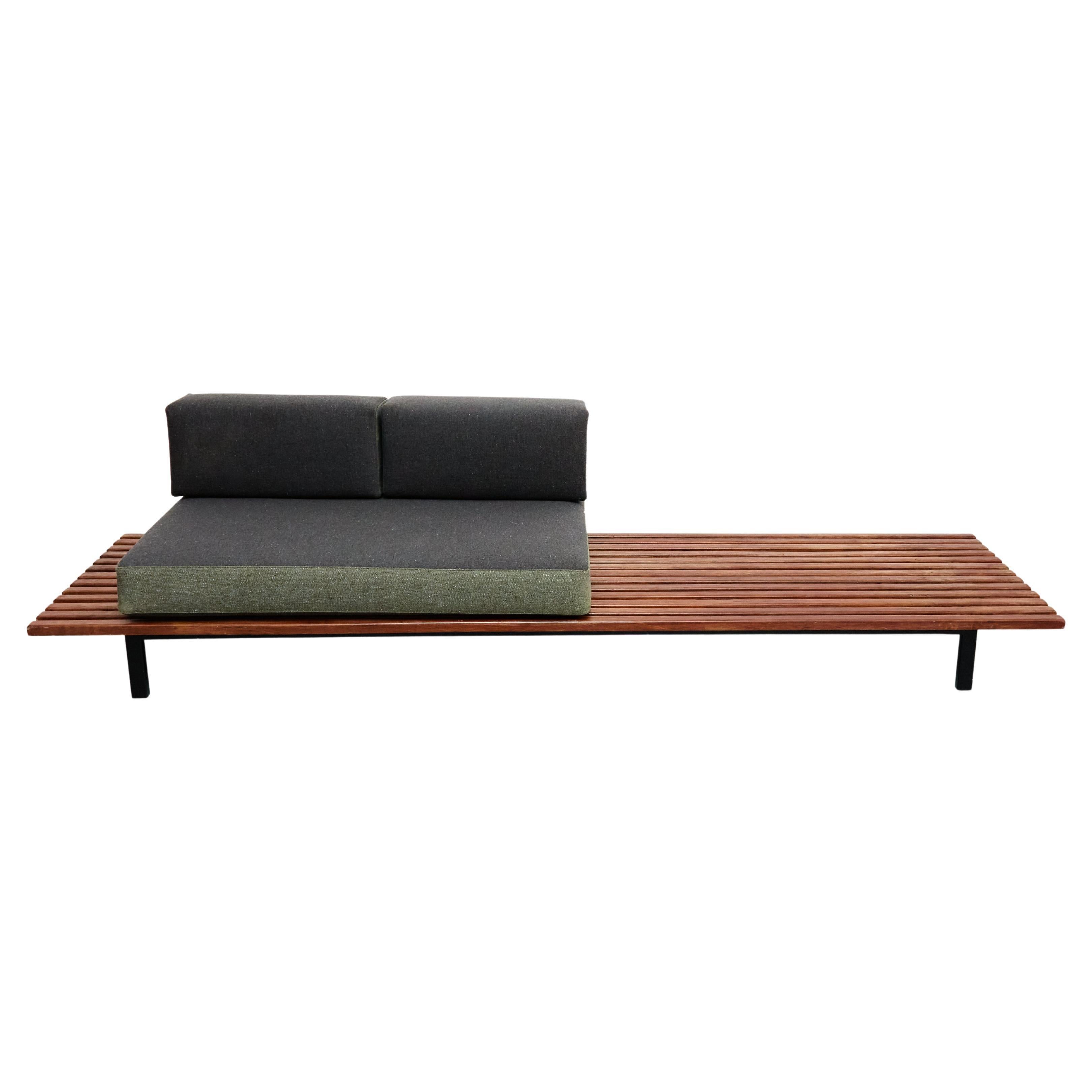 Bench designed by Charlotte Perriand.
Edited by Steph Simon.

Provenance: Cansado, Mauritania (Africa).

In original condition with minor wear consistent of age and use, preserving a beautiful patina.

Materials: 
Wood, metal, fabric

Dimensions: 
D