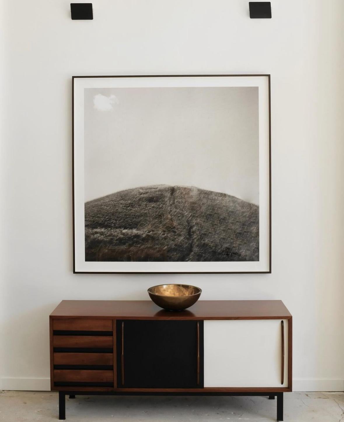 
Charlotte Perriand's creation of the 'Cansado' sideboard for Steph Simon in 1958 stands as a testament to her innovative approach, blending the essence of Mid-Century Modern and Modernist design. Crafted meticulously from rich mahogany, this iconic