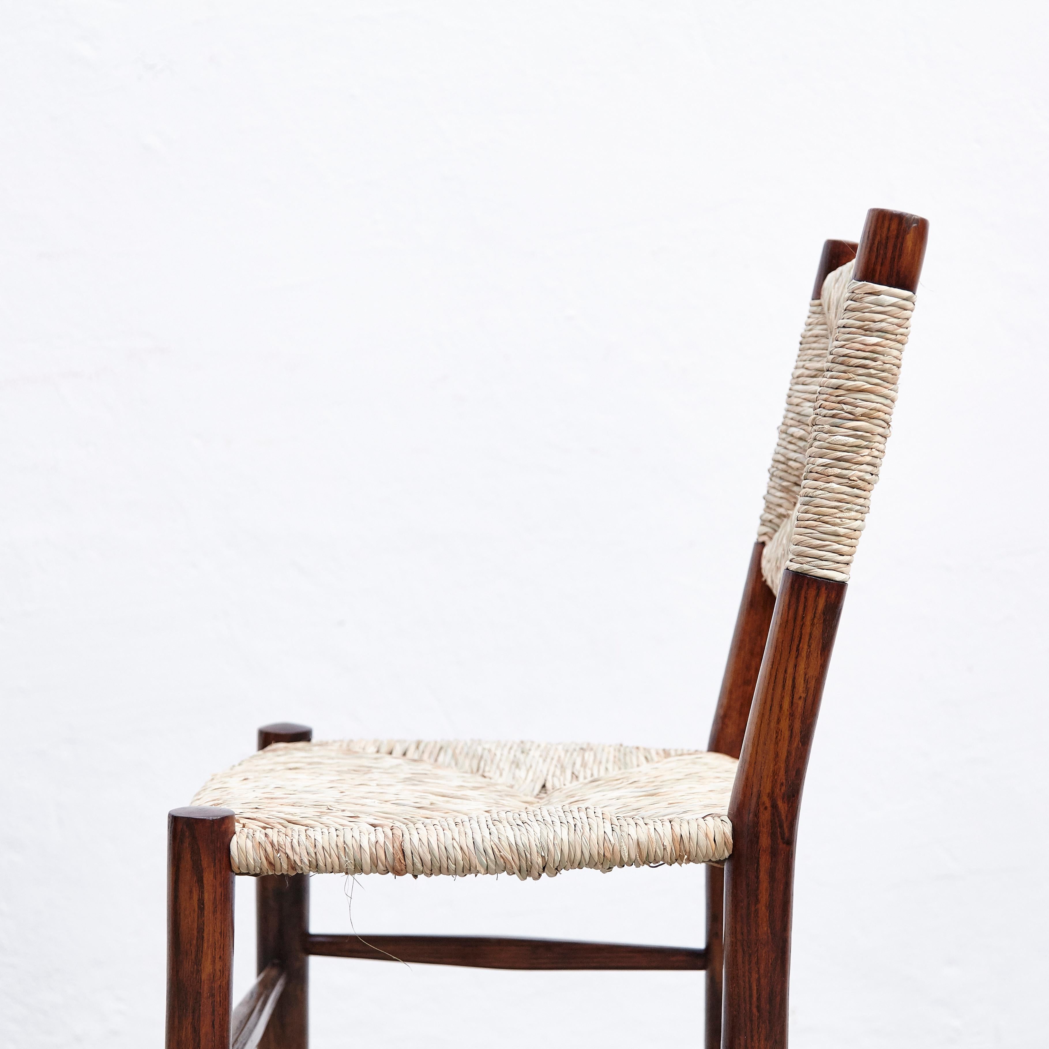 Charlotte Perriand, Mid Century Modern, Oak Rattan, Model 19 Bauche Chair, 1950 In Good Condition In Barcelona, Barcelona