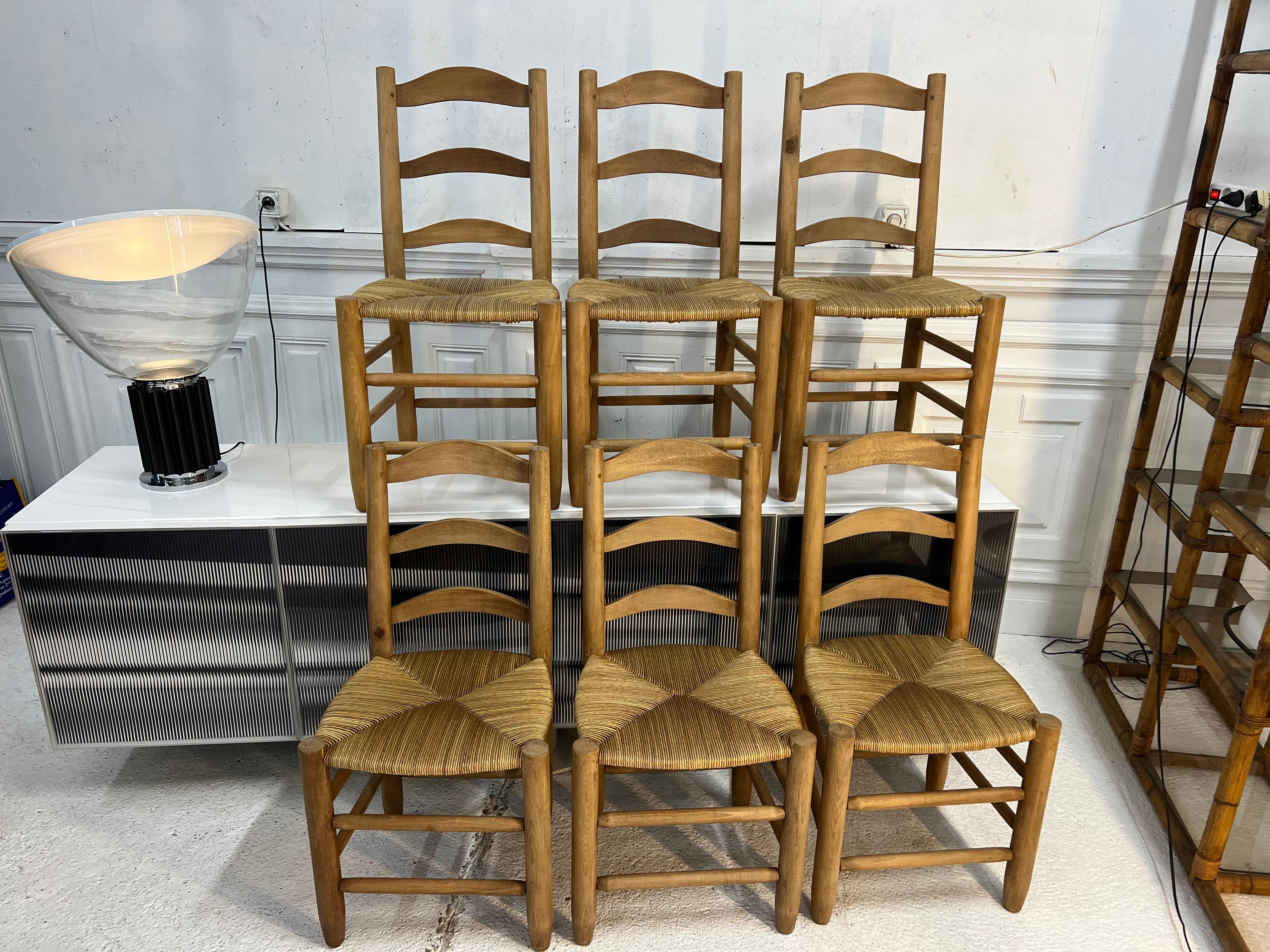 a pretty series of 6 rustic chairs by Charlotte Perriand
the chairs have been freshly reupholstered by a specialist
the beech structure is very solid with a beautiful 60's patina

 

Born to a tailor father and a seamstress mother for haute couture