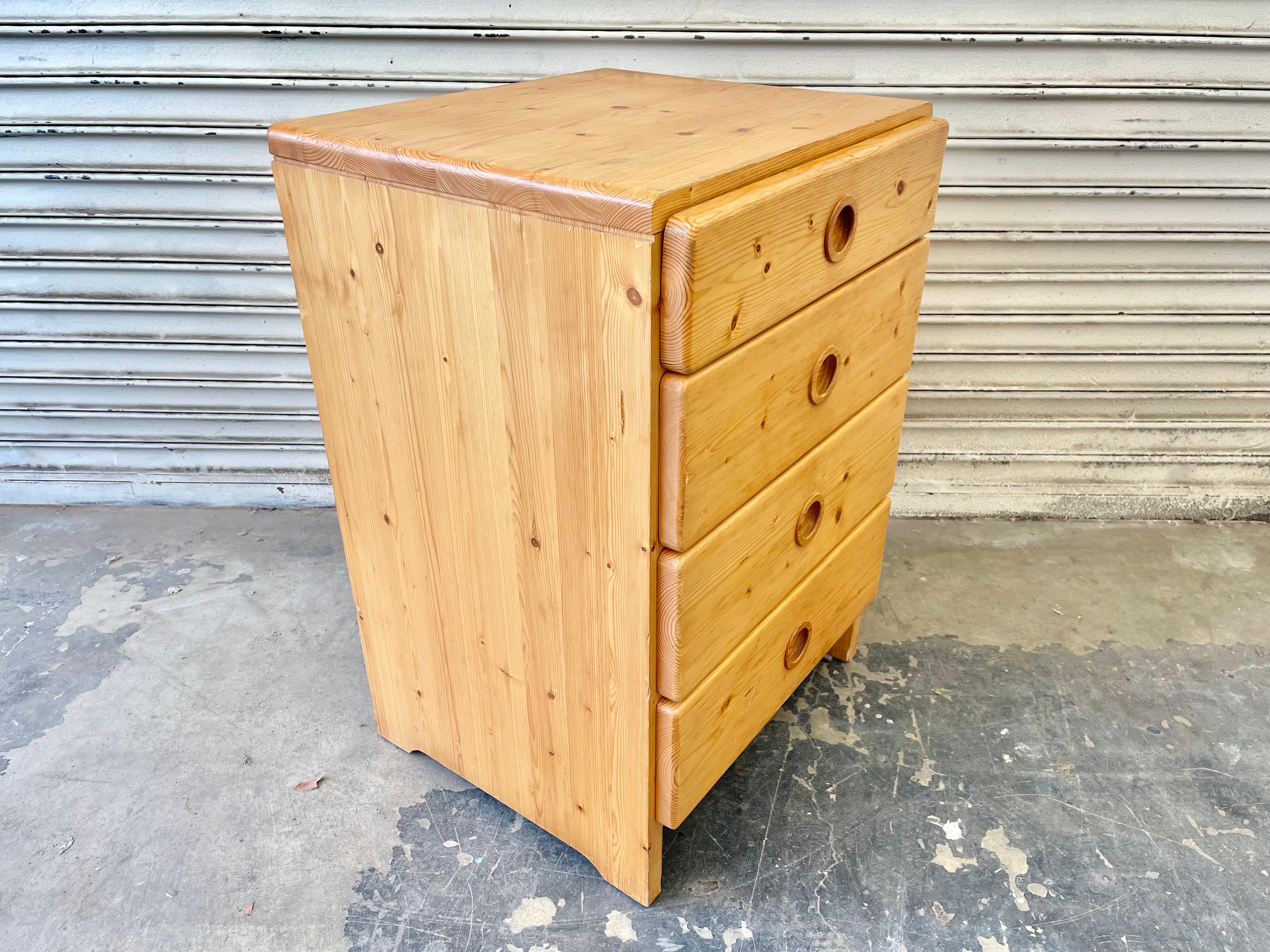 Pine chest of drawers by Charlotte Perriand for Les Arcs. 4 pull out drawers. Made of solid pine, circa 1960. Good original condition. Fun piece of collectible design from the popular French ski resort. 3 available. Priced individually.
     