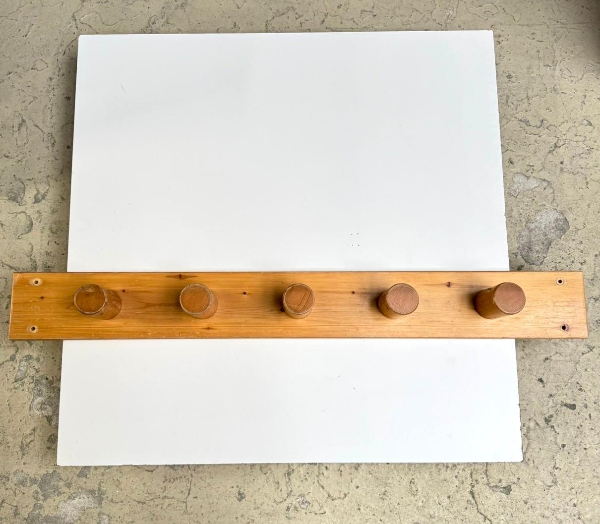The elegant and functional piece from Charlotte Perriand  for Les Arcs. Coat rack with five hooks. 

*for individual customer