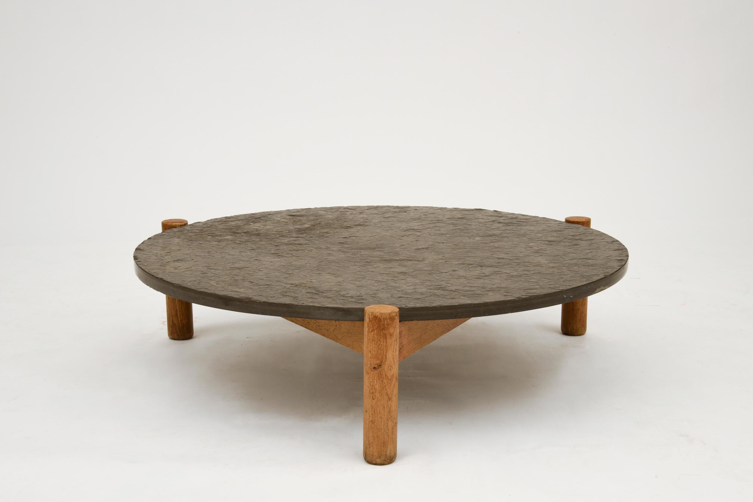 Oak and slate coffee table by Charlotte Perriand, circa 1950.
Beautiful example of Perriand's timeless design, the coffee table is in great condition.