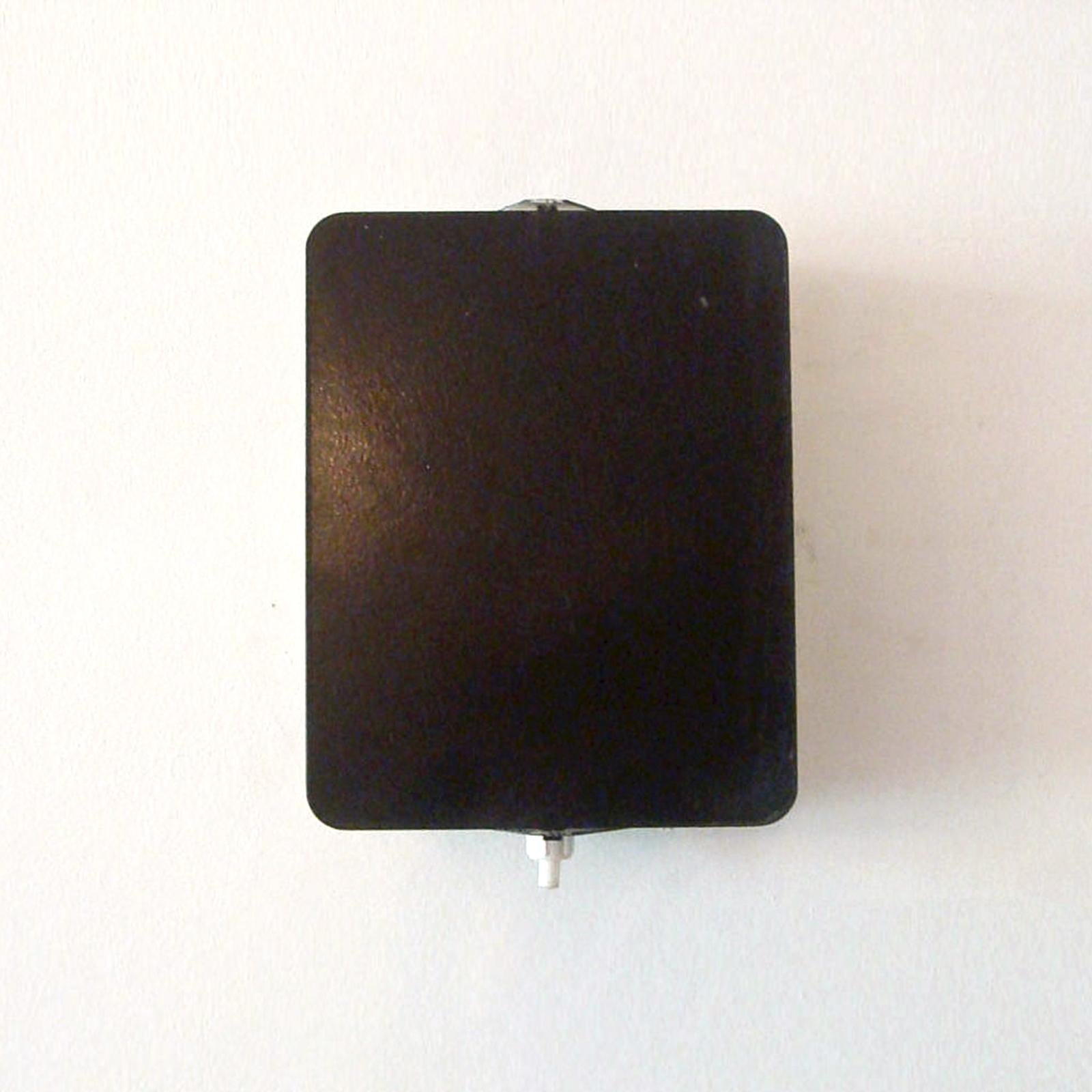 Iconic black and white enameled wall lights by Charlotte Perriand, adjustable reflectors, can be mounted horizontally or vertically, manufactured and distributed by Steph Simon, Paris, marked, wired for US standards, one E12 socket per fixture, max.