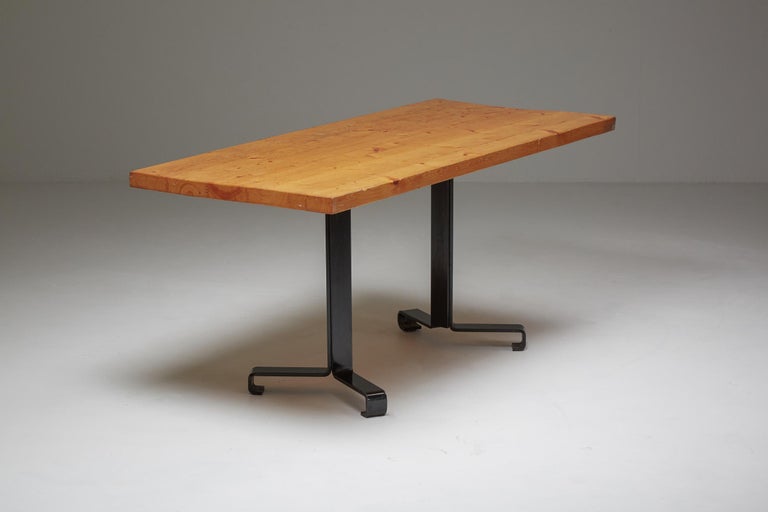 Solid pine wood, black metal, dining table, Charlotte Perriand, Les Arcs, France, 1960s

Les Arcs, a 1960s ski resort in France designed by a collective of architects led by Charlotte Perriand, is celebrating its half centenary. 
Part of the