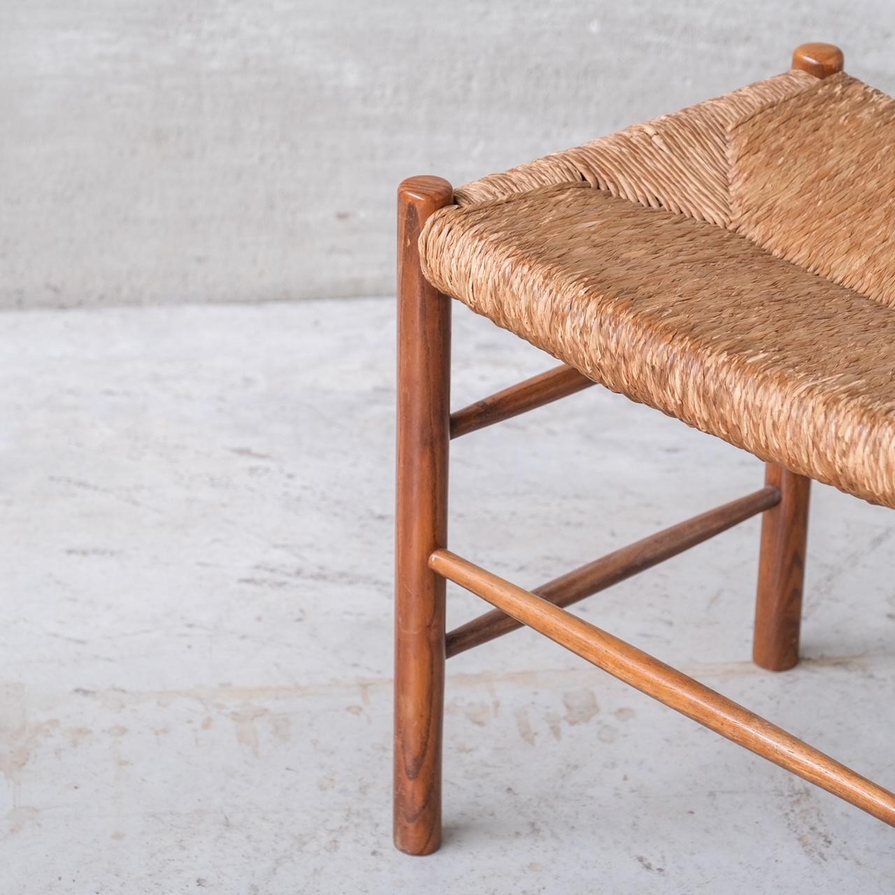 A scarce stool in rush and wood, Charlotte Perriand 'Dordogne' model, typically presented in dining chair form.

A single available which came with a wider set of dining chairs.

Scarce.

France, c1950s.

Good vintage condition, some scuffs and wear