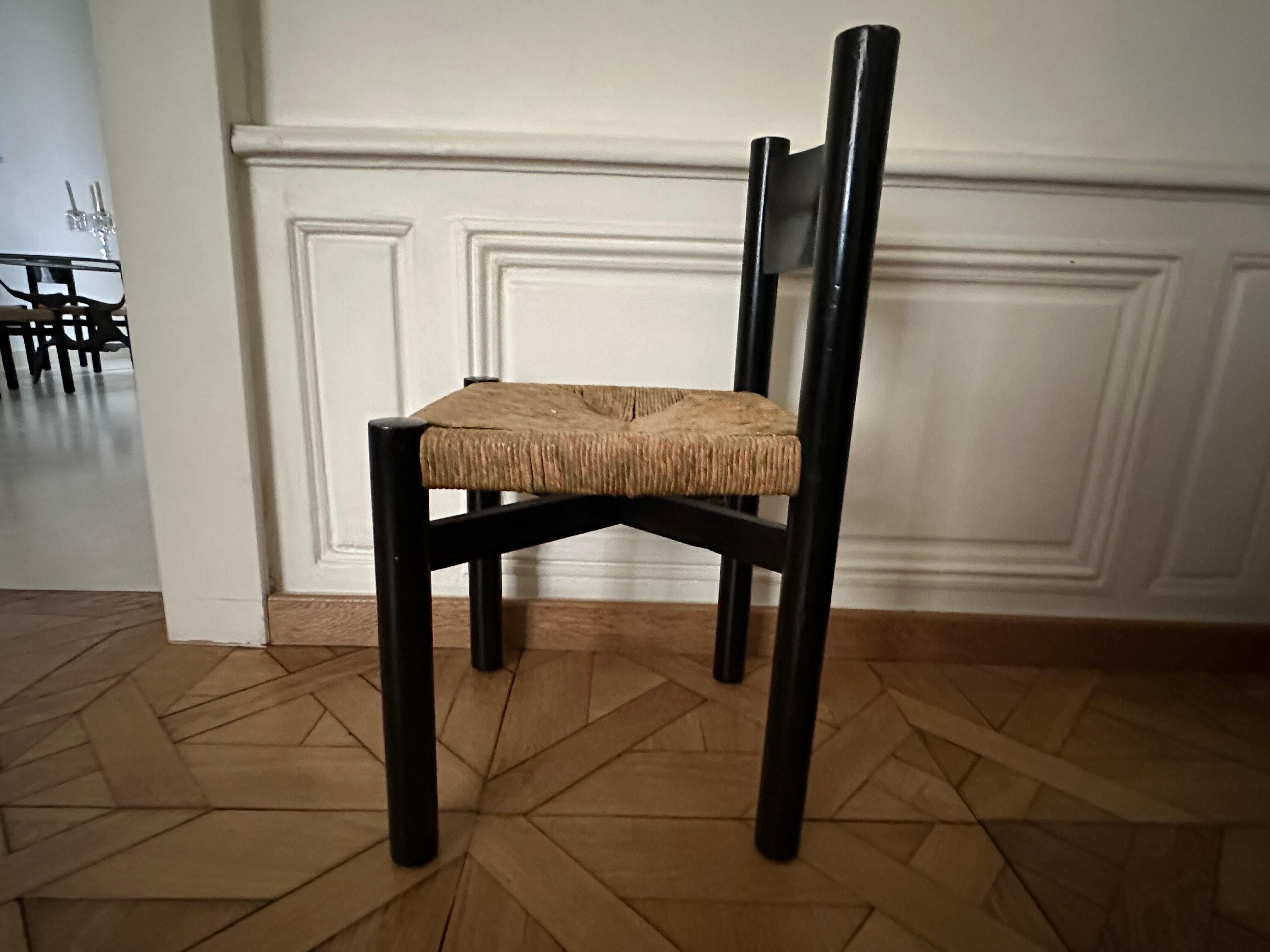 French Charlotte Perriand ensemble of 6 black chairs For Sale