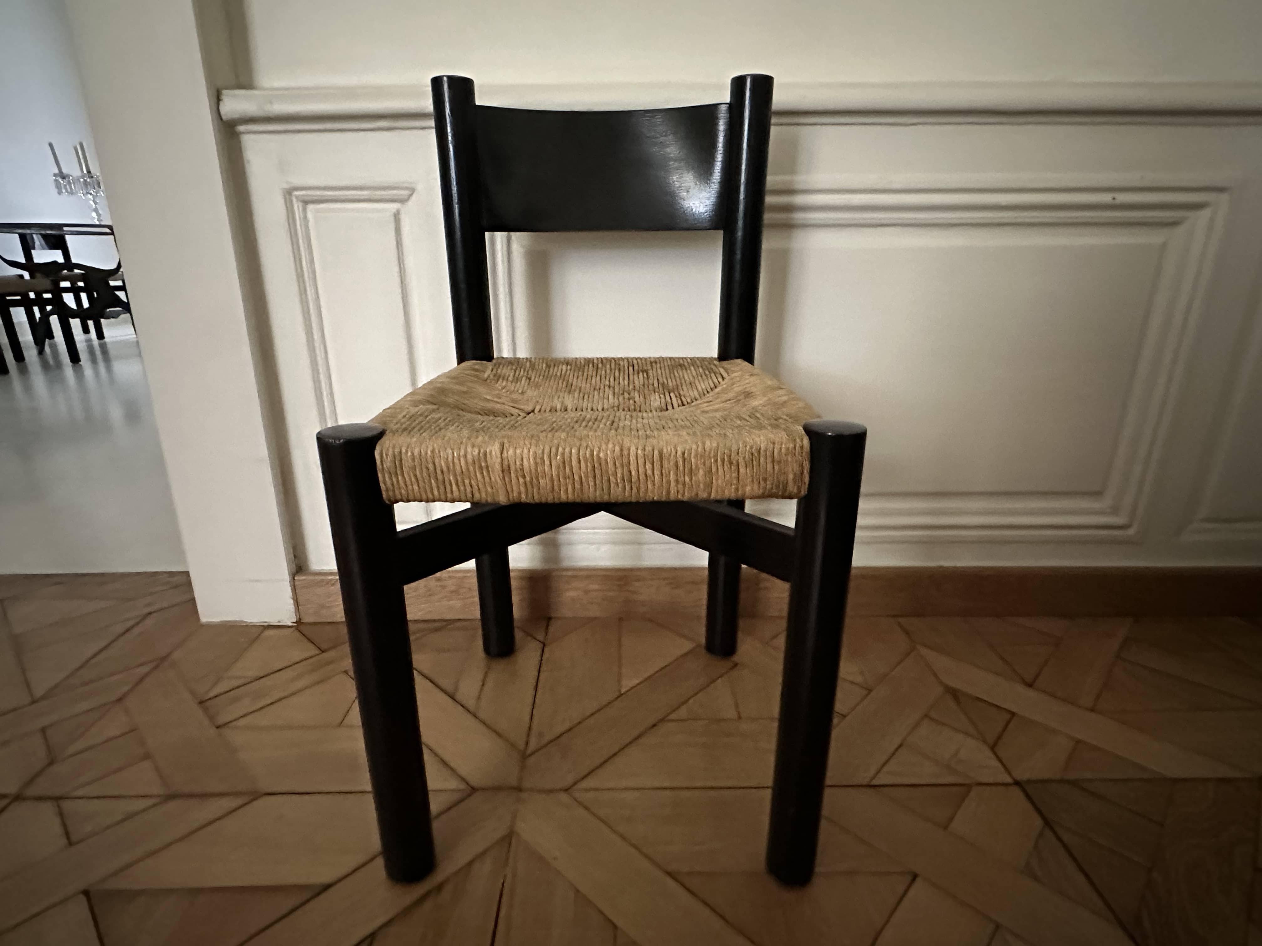 Mid-20th Century Charlotte Perriand ensemble of 6 black chairs For Sale