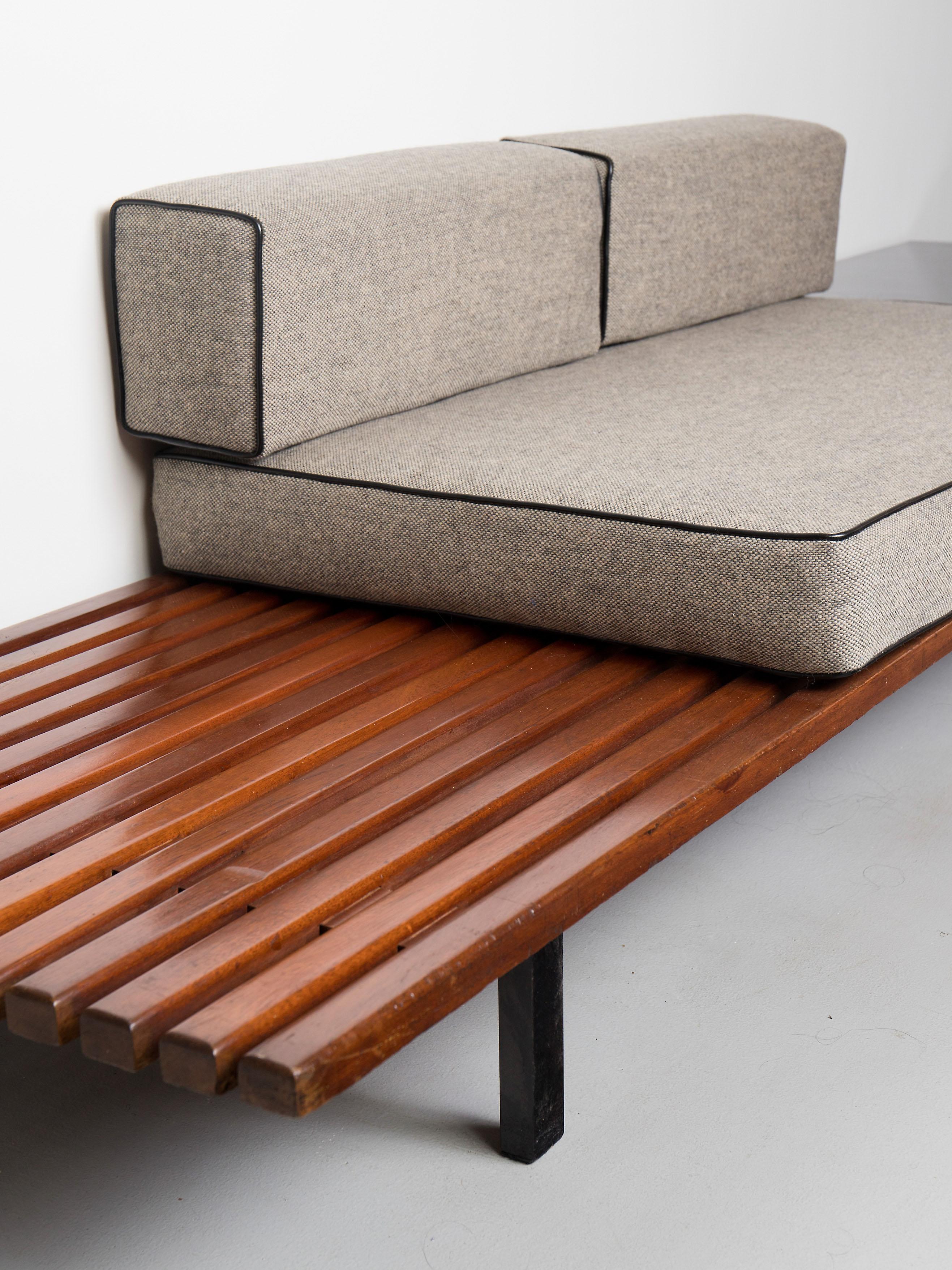 Large mahogany bench with drawer by Charlotte Perriand from Cansado, Mauritania, circa 1958.
Mahogany top has been gently cleaned, metal frame is in original condition and two - tone cushions are newly made.
  