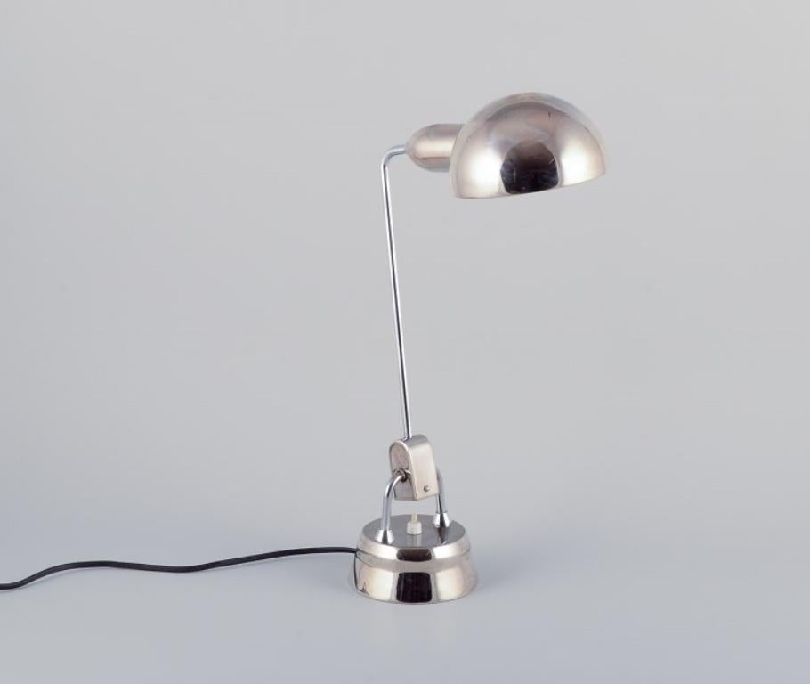 French Charlotte Perriand for Jumo, France. Desk lamp in chromed metal. For Sale