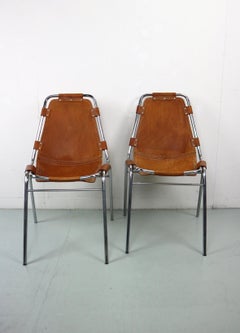 Charlotte Perriand for "Les Arc" Set of 2 Original Leather side chairs, 1960