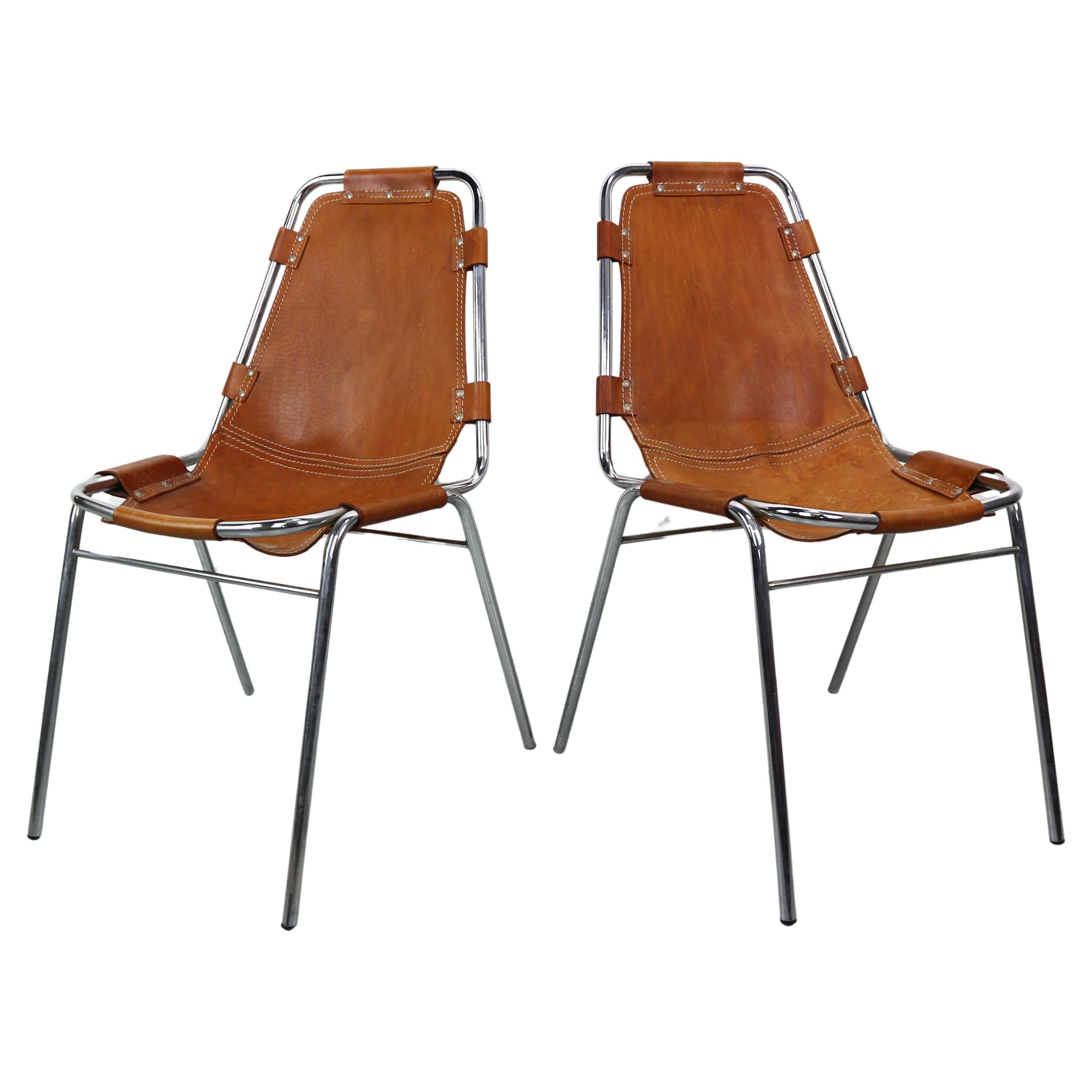 Charlotte Perriand for "Les Arc" Set of 2 Original Leather side chairs, 1960 For Sale