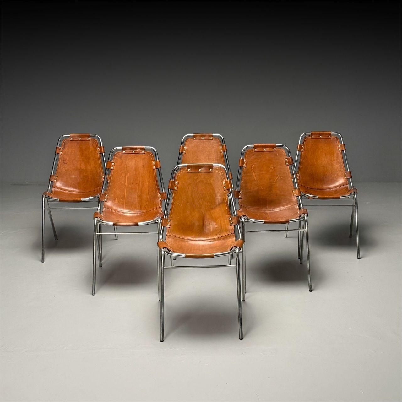 Charlotte Perriand, French Mid-Century Modern, Six Les Arcs Dining or Side Chairs, Chrome, Distressed Cognac Leather

Set of six stackable dining chairs selected by Charlotte Perriand for the Les Arcs ski resort in France circa 1970s featuring