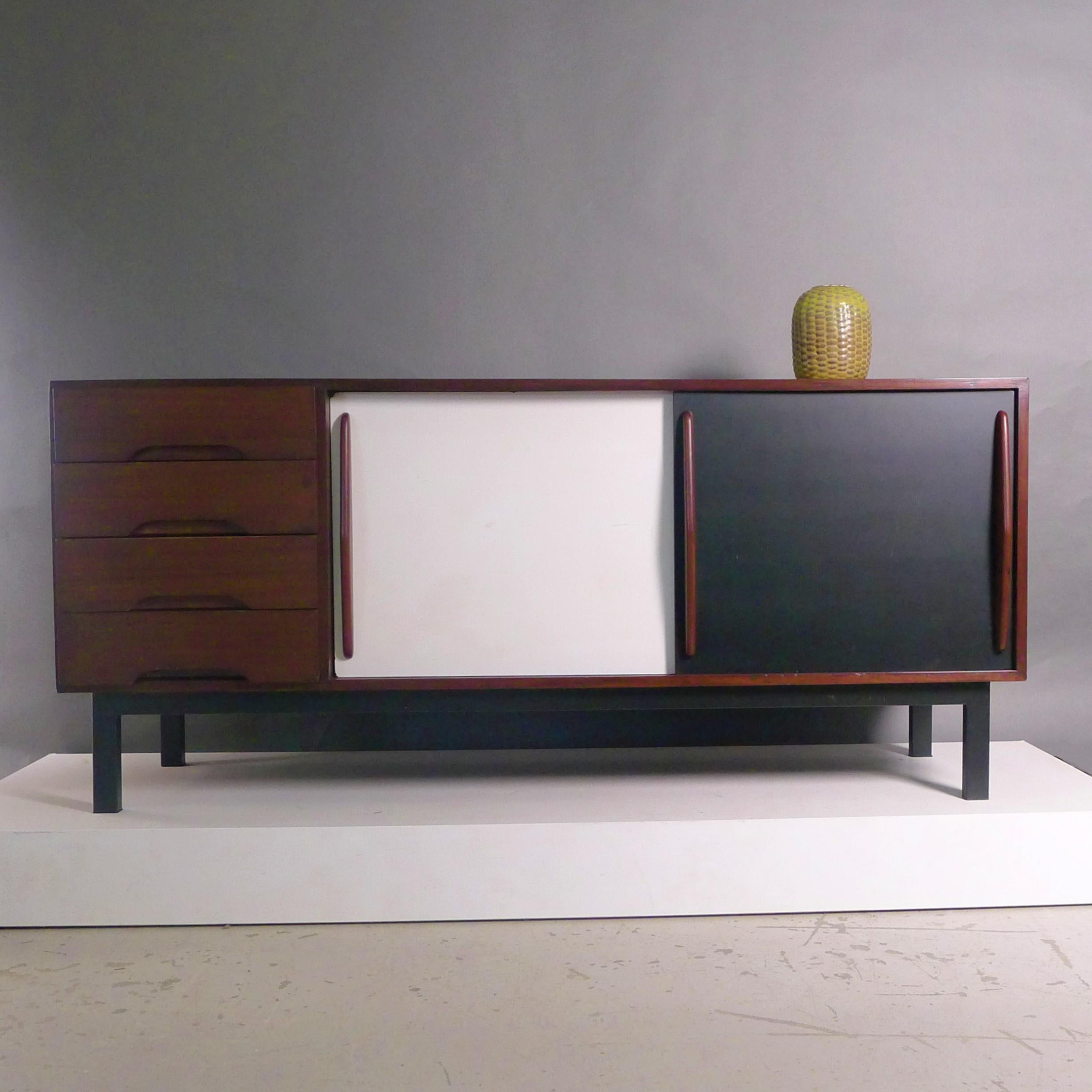 Charlotte Perriand (1903-1999)
Cansado Sideboard 
produced by Steph Simon in France, circa 1958

Charlotte Perriand was commissioned to design furniture for apartments in  Cité Cansado, a town designed according to Modernist principles for use by