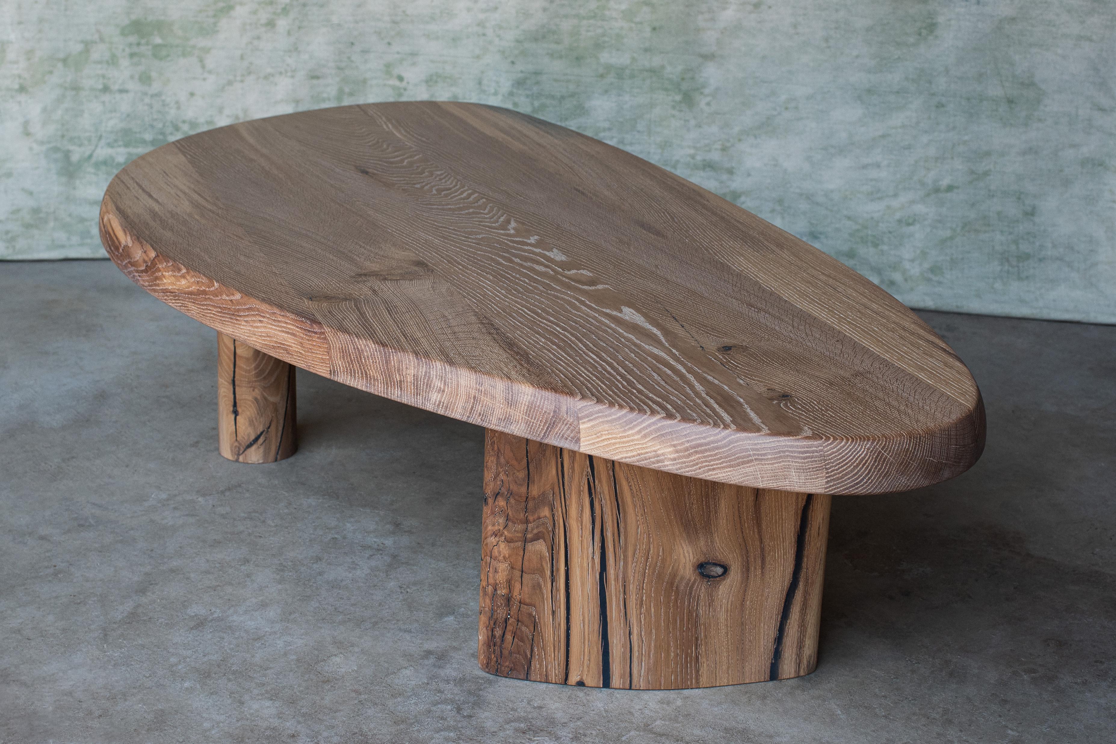Elevate your interior décor and indulge in the beauty of functional art with this solid oak coffee table inspired by the brilliance of Charlotte Perriand. Whether placed in a modern, minimalist setting or a more eclectic environment, this coffee