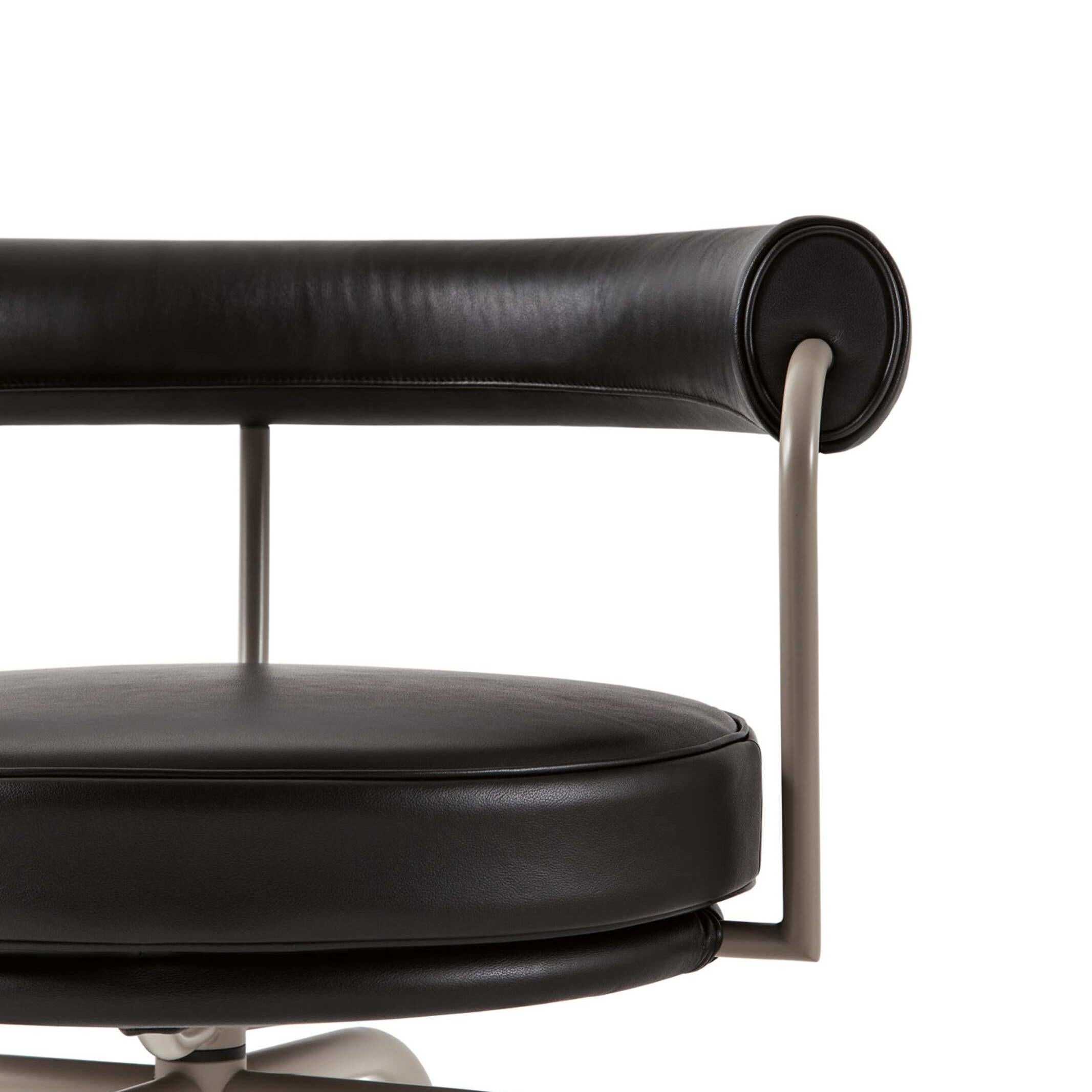 Black leather upholstered LC7 chair designed by Charlotte Perriand in 1927. Relaunched in 1978.
Manufactured by Cassina in Italy.

Designed by Charlotte Perriand and part of the LC collection by Le Corbusier, Pierre Jeanneret and Charlotte