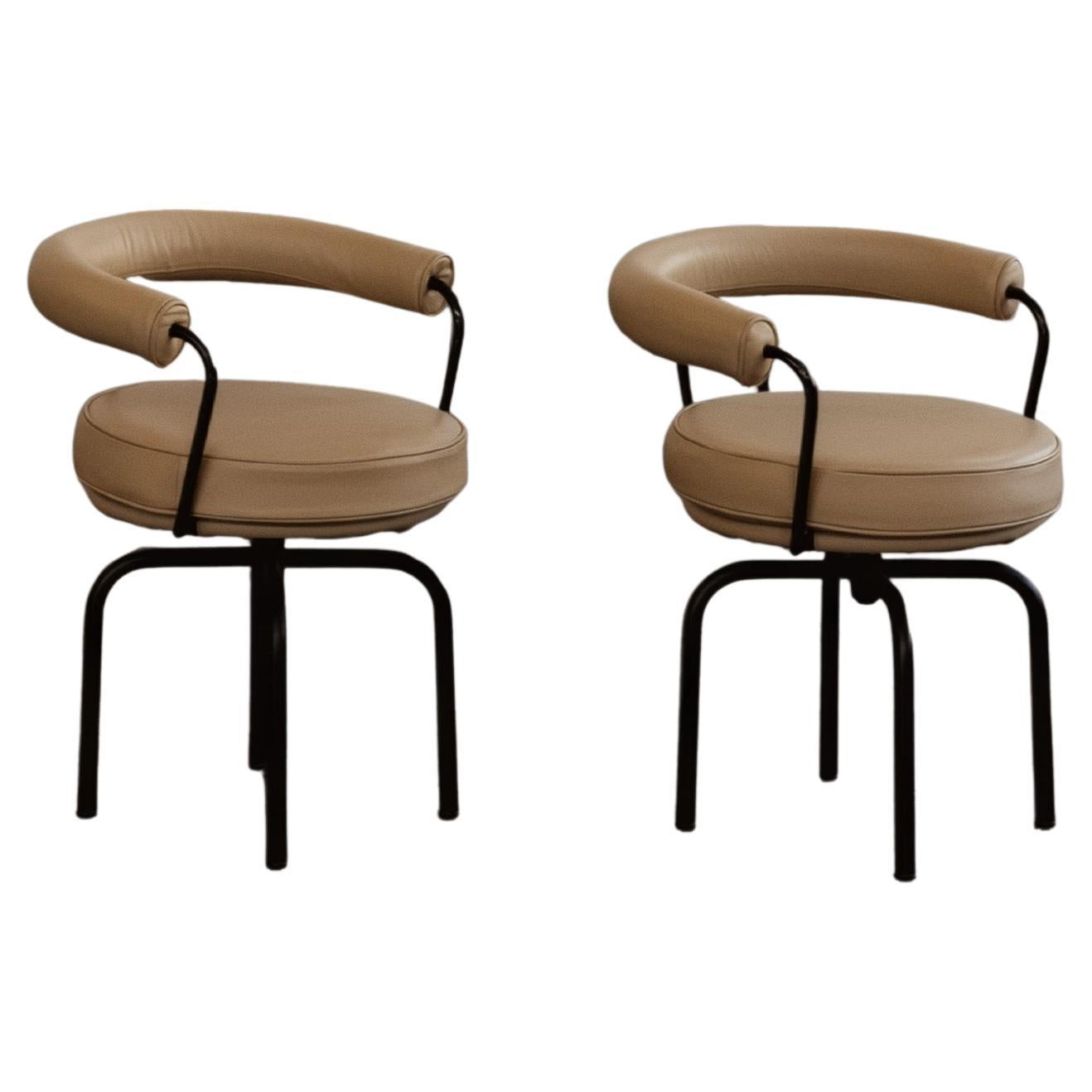 Charlotte Perriand “LC7” Chairs for Cassina, 1927, Sand Beige Leather, Set of 2