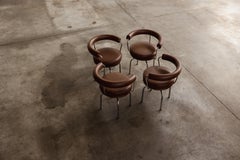 Charlotte Perriand “LC7” Chairs for Cassina, Brown Leather, 1927, Set of 4