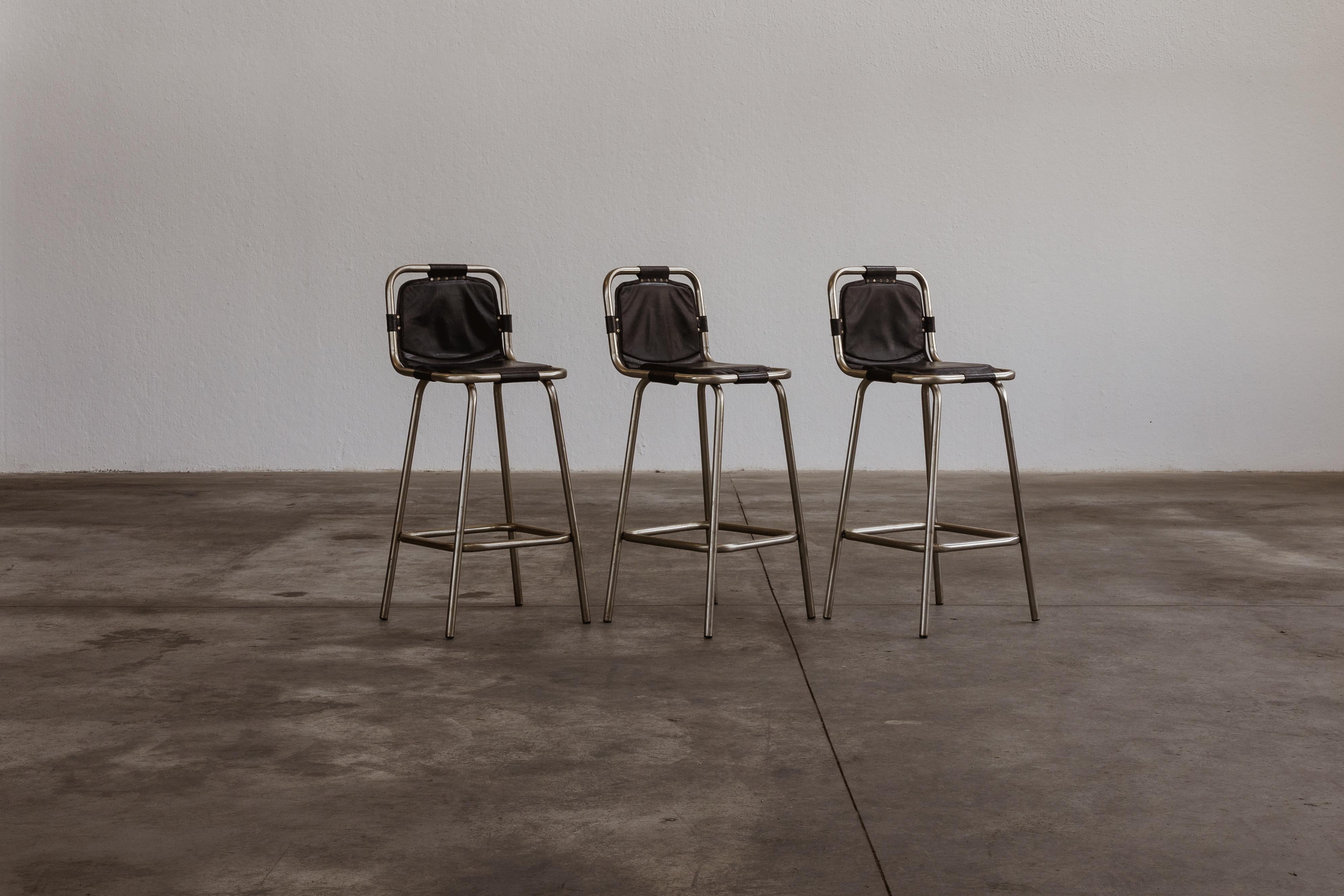 Charlotte Perriand “Les Arcs” bar stools for Cassina, iron and leather, 1960s, set of three.

In the illustrious design world, visionary Charlotte Perriand introduced the iconic and elusive Les Arc Bar Stools in the 1960s. Originally envisioned for