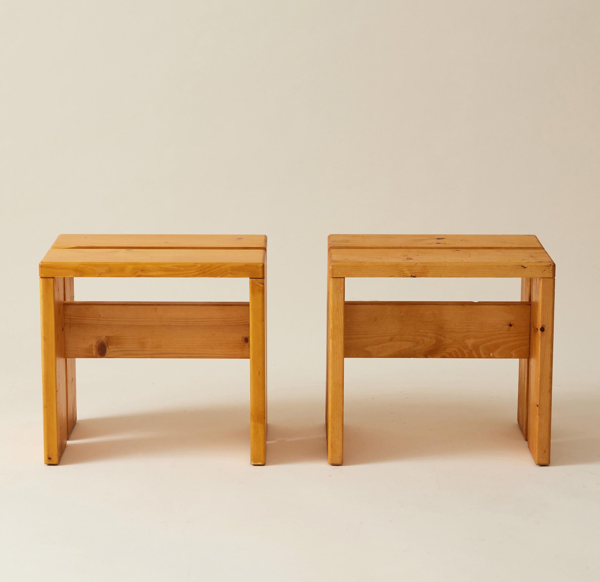 Stools or side tables designed by Charlotte Perriand for Les Arcs Ski Resort in France. These solid pine wood stools embody the essence of minimalist design bringing both comfort and style to your space. These stools have been very lightly