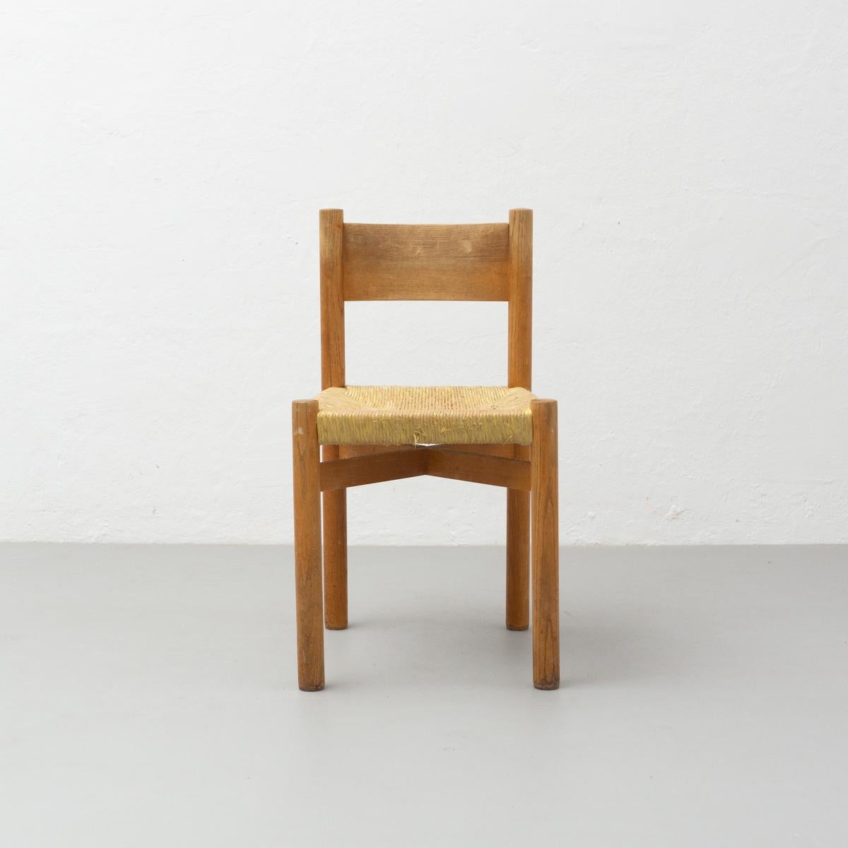 Chair model Meribel designed by Charlotte Perriand, circa 1950.
Manufactured in France.

Wood and rattan.

In original condition, with minor wear consistent with age
and use, preserving a beautiful patina.

Charlotte Perriand (1903-1999) She