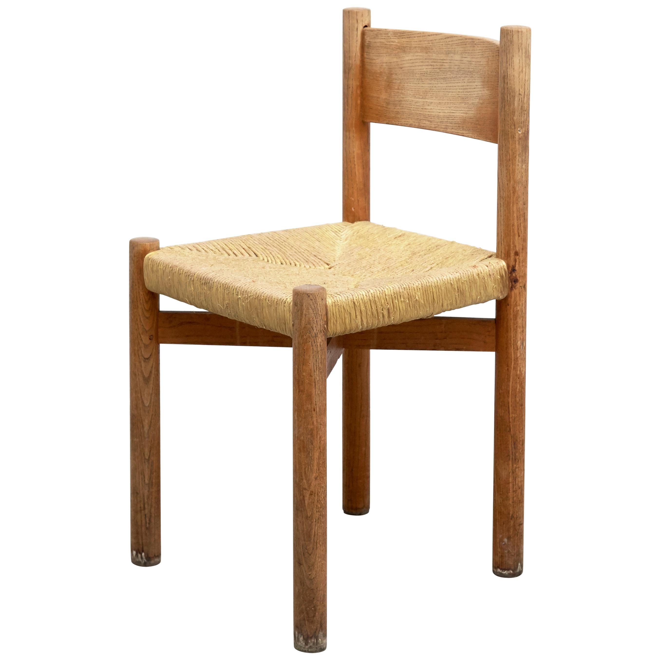 Chair model Meribel designed by Charlotte Perriand, circa 1950.
Manufactured in France.

Wood and rattan.

In original condition, with minor wear consistent with age
and use, preserving a beautiful patina.

Charlotte Perriand (1903-1999) She