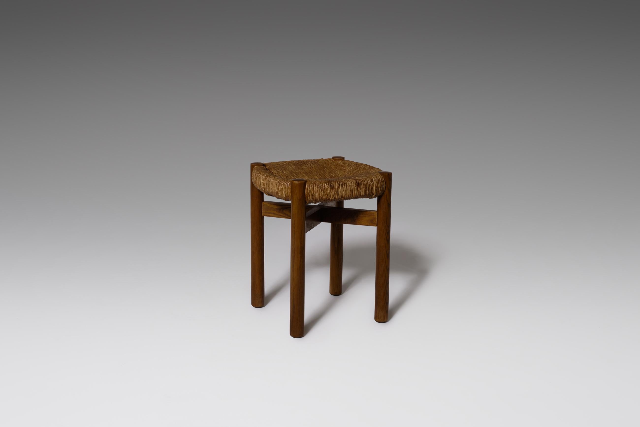 Important stool in stained ash and rush by Charlotte Perriand, France ca 1948. The stool was originally used in the Chalet-Hotel 'Le Doron' in ski resort Meribel Les Allues, which was built between 1946-1948 by architects Paul Grillo & Christian