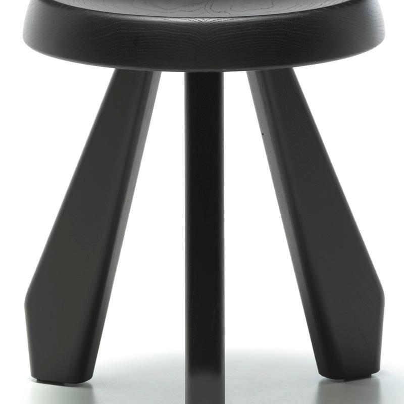 Stool model Meribel designed by Charlotte Perriand in 1953-61. 
Oak stained black.
Relaunched by Cassina in 2011.
Manufactured by Cassina in Italy.

Reclaiming simple materials and basic shapes, with an eye to architecture and mountain life,