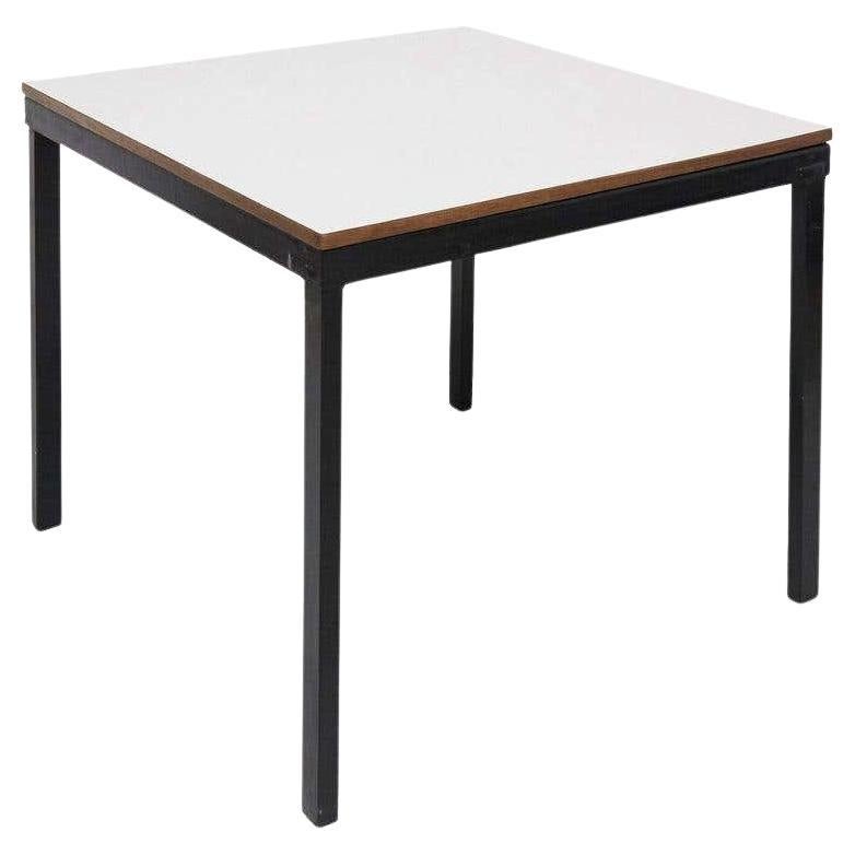 Bridge table designed by Charlotte Perriand, circa 1950 from Cité Cansado, Mauritania, Africa. 

Editioned by Steph Simon, France.

Painted steel, plastic laminate-covered wood.

Measures: 74.3 x 80 x 80 cm

In good original condition, with minor