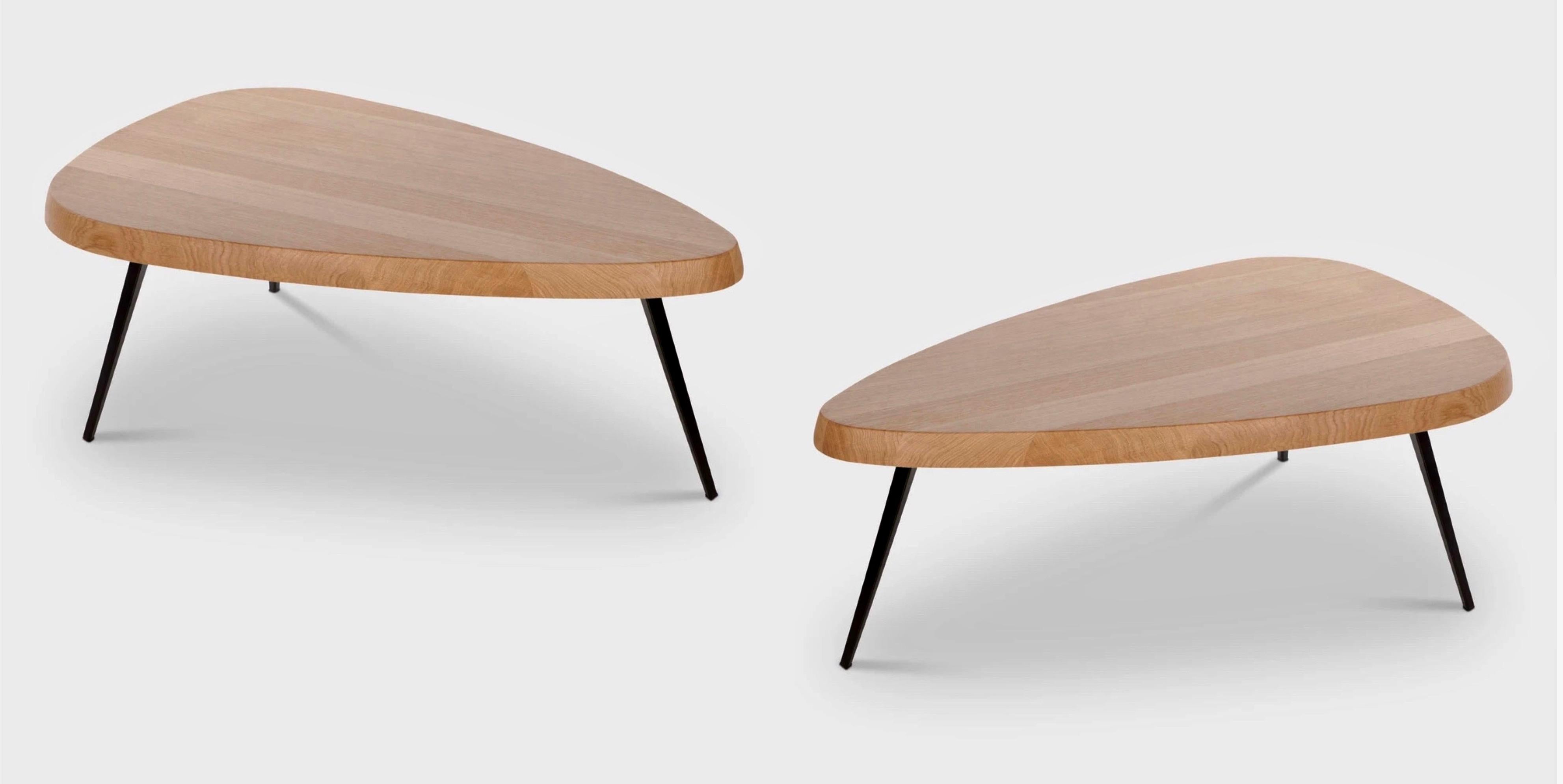 French architect and designer Charlotte Perriand's pair of Mexique Oak Low Tables were made in 2018 by Cassina. Part of their Maestri Collection, these tables were originally designed in 1952 for the Maison du Mexique at the Cité Universitaire