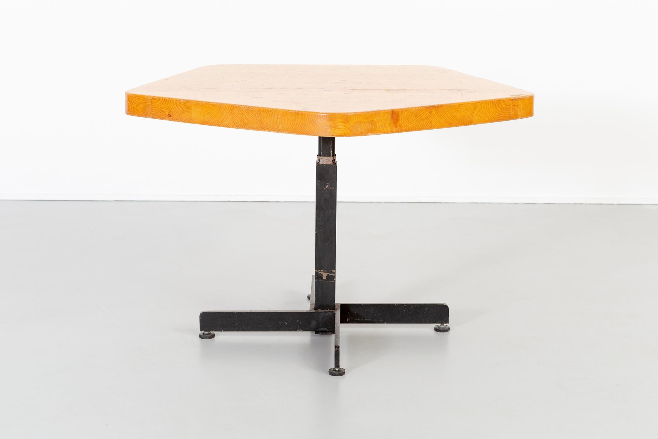 Pentagonal table

Designed by Charlotte Perriand for Les Arcs, 2000.

France, circa 1968.

Enameled steel and pine

Measures: 24 ?” H x 36 ¼” W x 35 ?” D.

Table height can be adjusted; this particular form was utilized in many Les Arcs