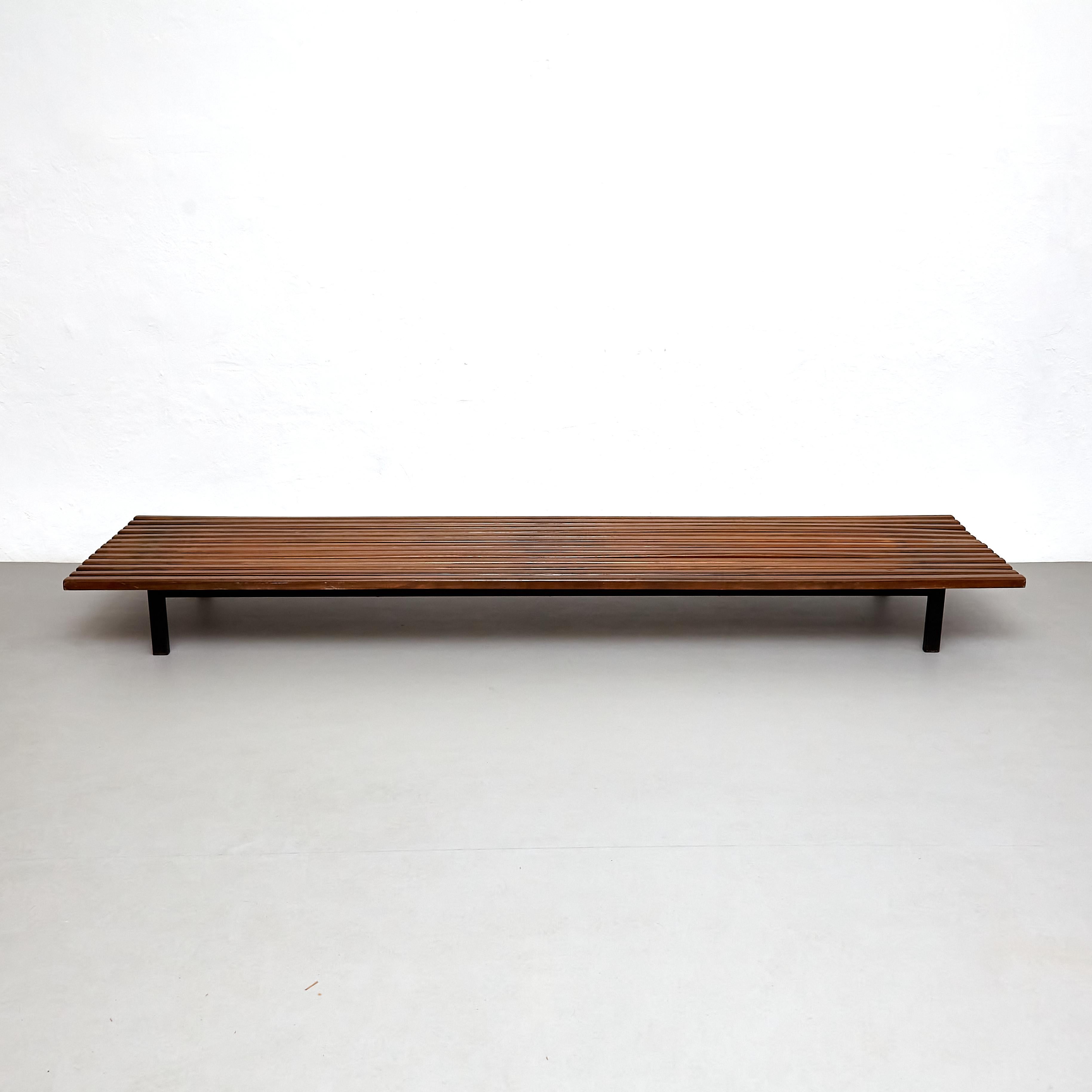 Bench designed by Charlotte Perriand.
Edited by Steph Simon.

Provenance: Cansado, Mauritania (Africa).

In original condition with minor wear consistent of age and use, preserving a beautiful patina.

Materials: 
Wood, metal 

Dimensions: