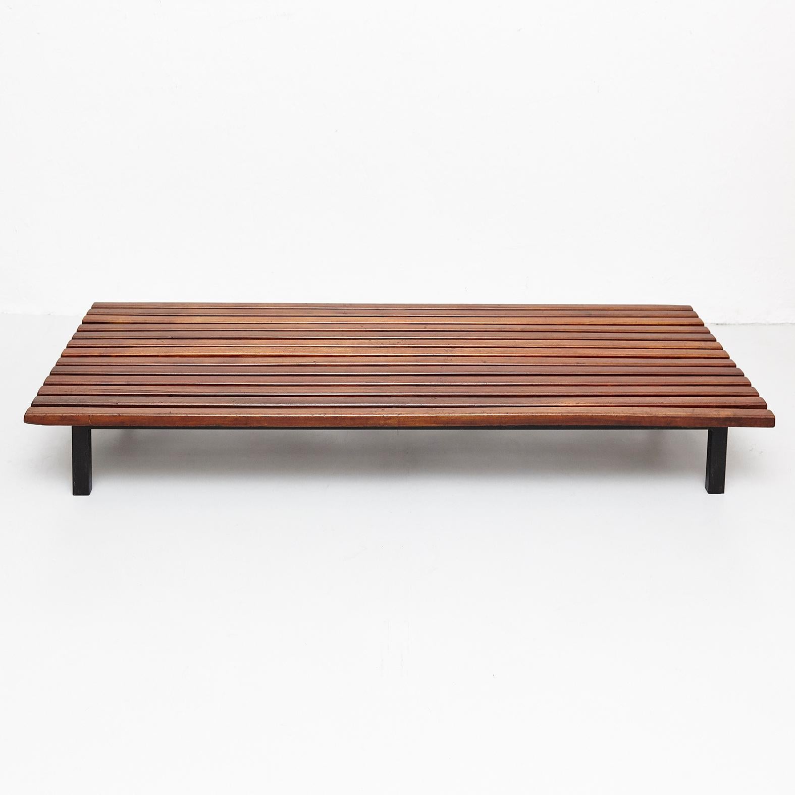 Bench designed by Charlotte Perriand, circa 1950.
Manufactured by Steph Simon (France) circa 1950.
Wood, lacquered metal frame and legs.

Provenance: Cansado, Mauritania (Africa).

In original condition, with minor wear consistent with age and