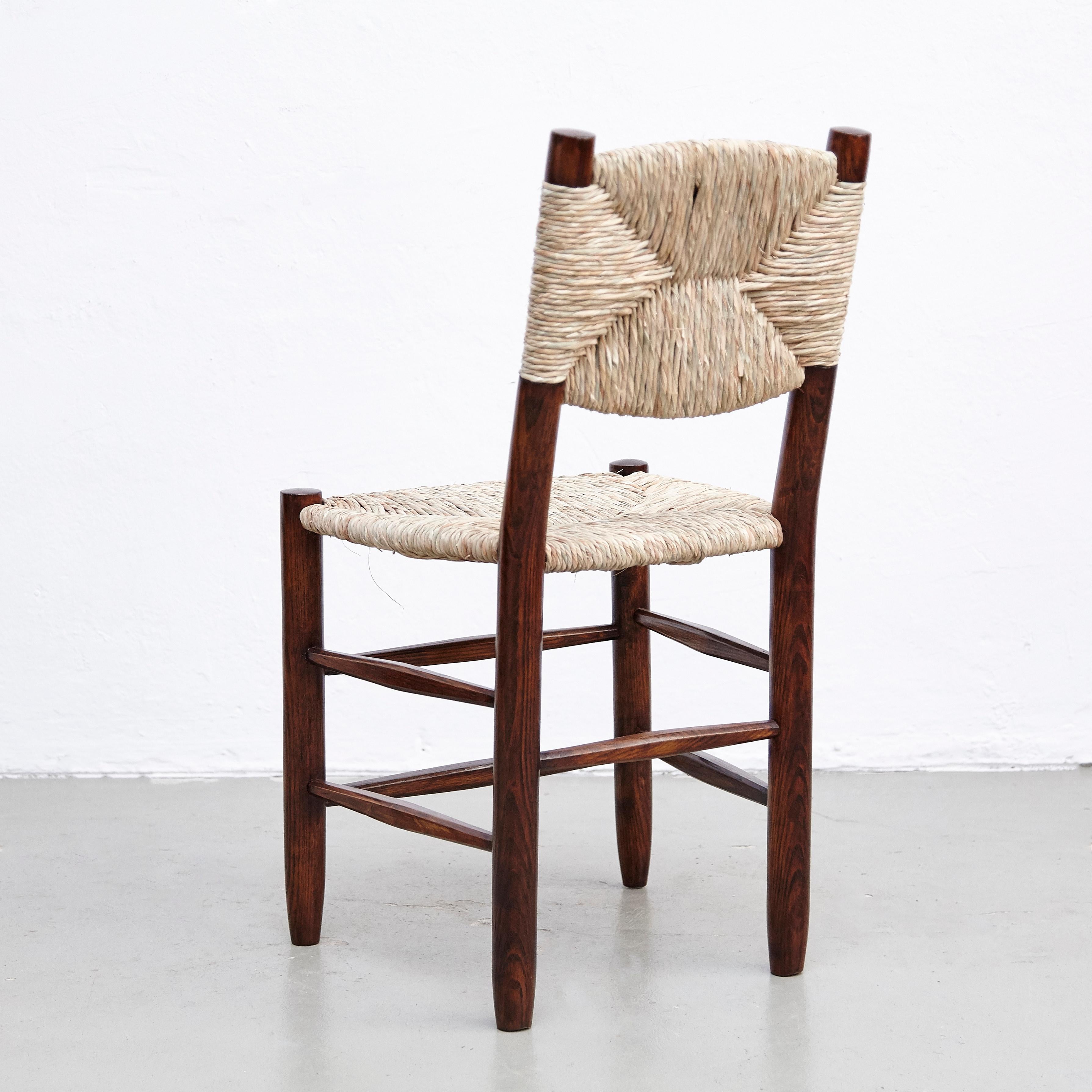 Charlotte Perriand Mid-Century Modern, Oak Rattan, Model 19 Bauche Chair, 1950 In Good Condition In Barcelona, Barcelona